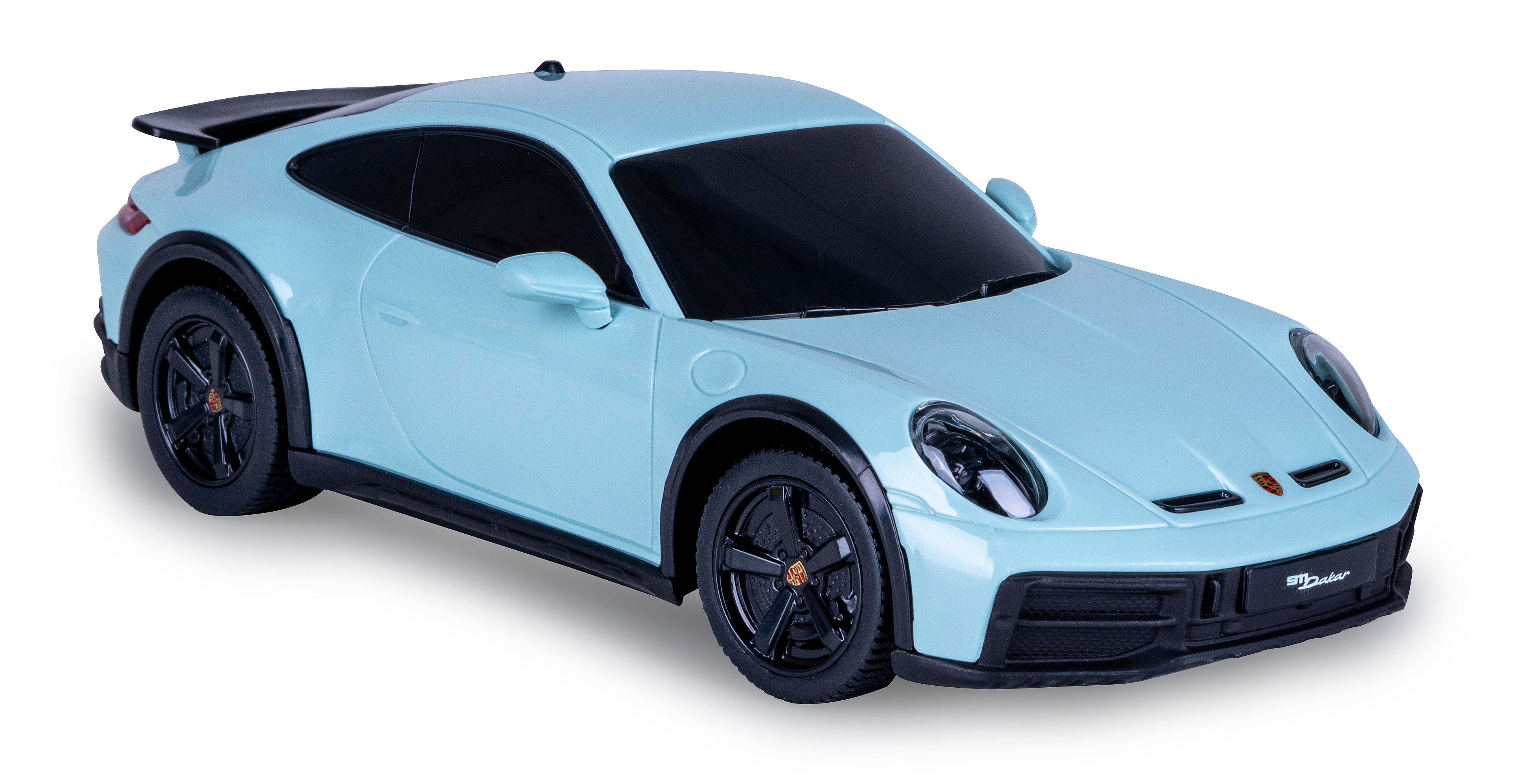 Ein hellblaues Spielzeugauto, ein Porsche 911 Dakar Modell, auf weißer Oberfläche. Es hat schwarze Räder.