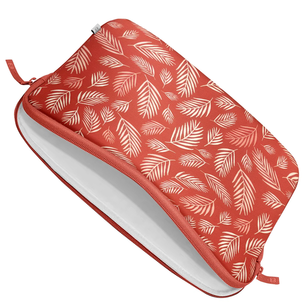 Red laptop sleeve with white leaf pattern and zipper.