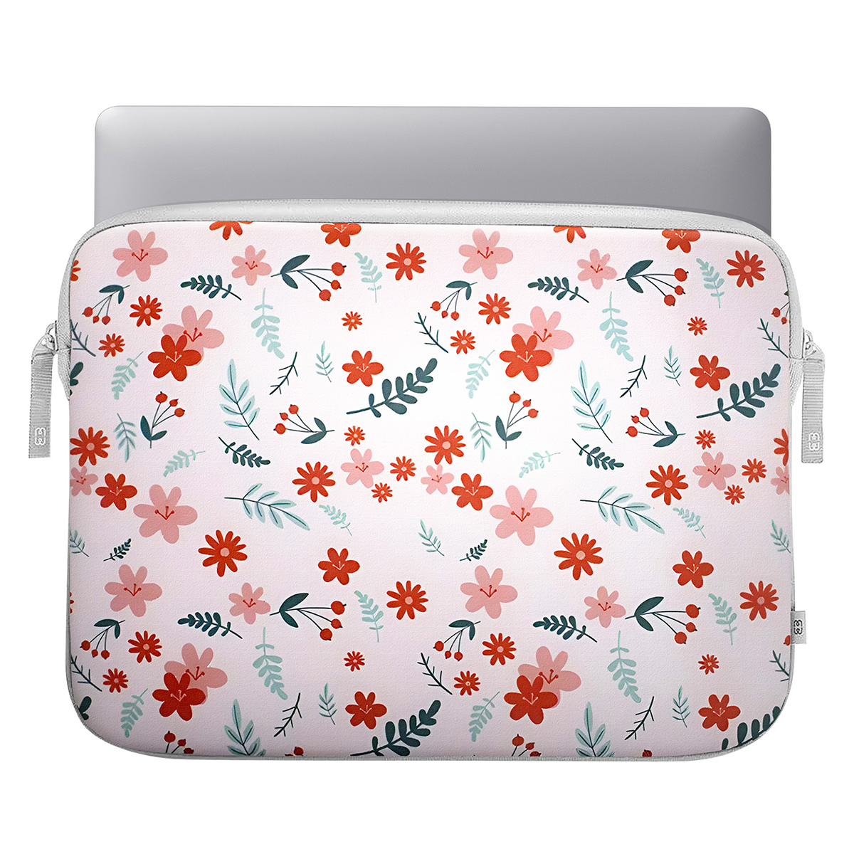 A laptop in a floral pattern sleeve, top view on white surface.