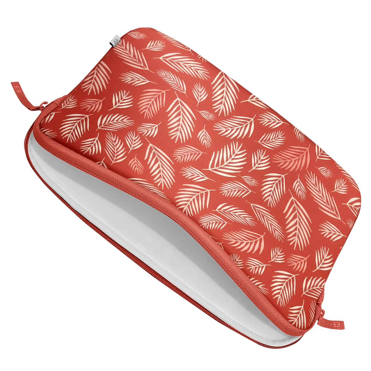 Laptop sleeve with a red background and white leaf pattern. The zipper is open.