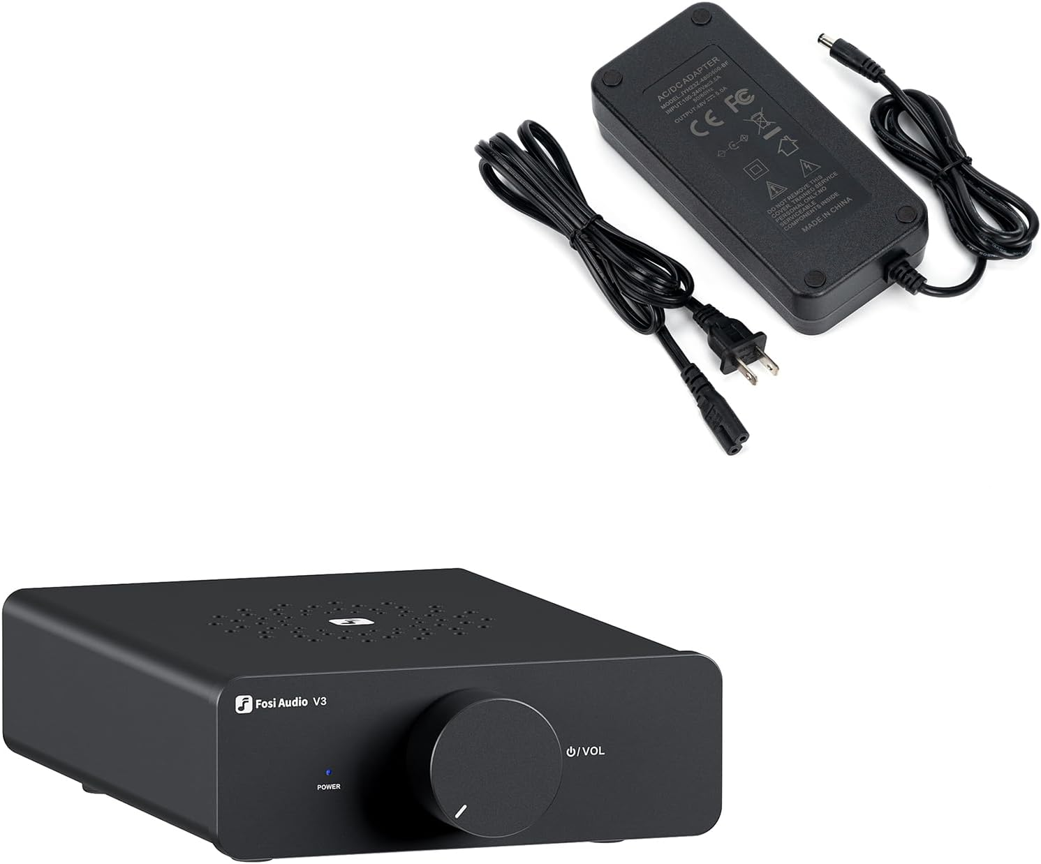 Amplificateur audio et alimentation noirs. L'amplificateur a un gros bouton. L'alimentation est rectangulaire avec câble.