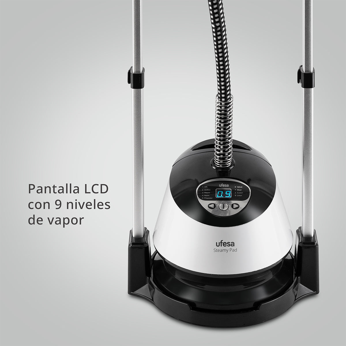 Una base de vaporizador Ufesa con pantalla LCD. El vaporizador es blanco y negro, con barras plateadas.