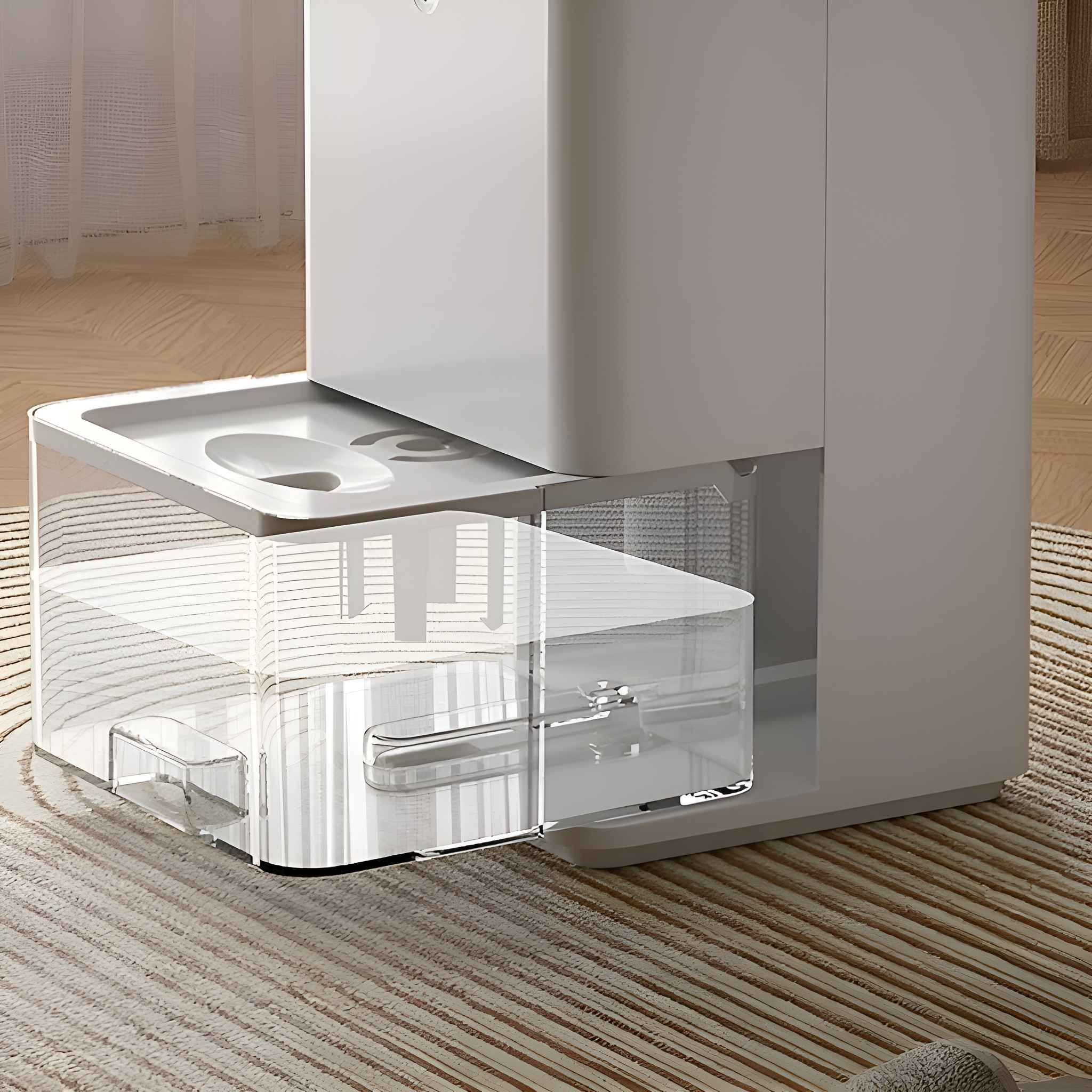 Nahaufnahme des Luftentfeuchterbodens mit Wassertank und Komponenten.