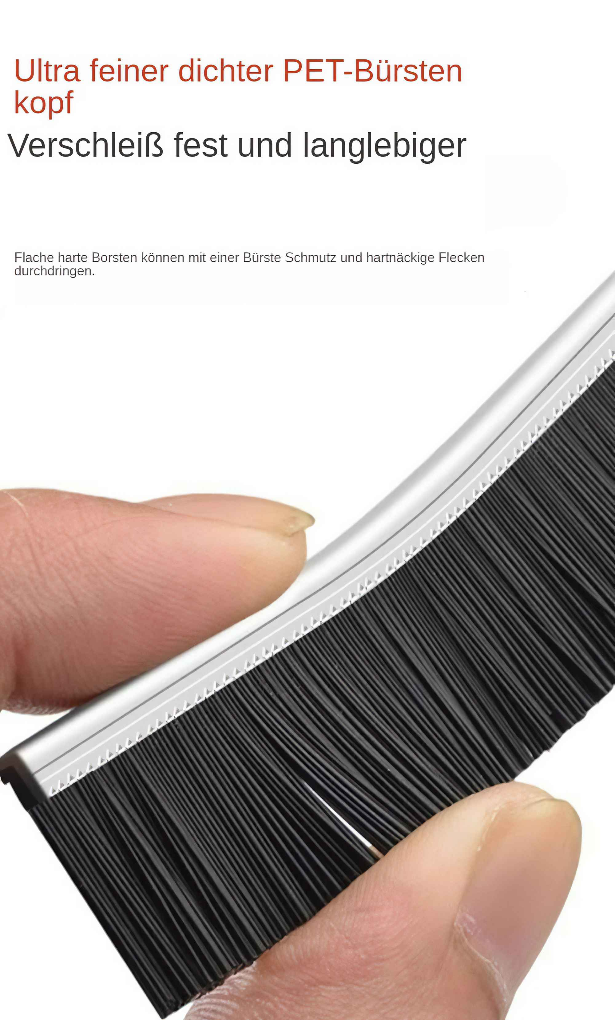 Nahaufnahme eines schwarzen Bürstenkopfes mit feinen Borsten, gehalten von Fingern. Silber- und Weißakzente sind sichtbar.