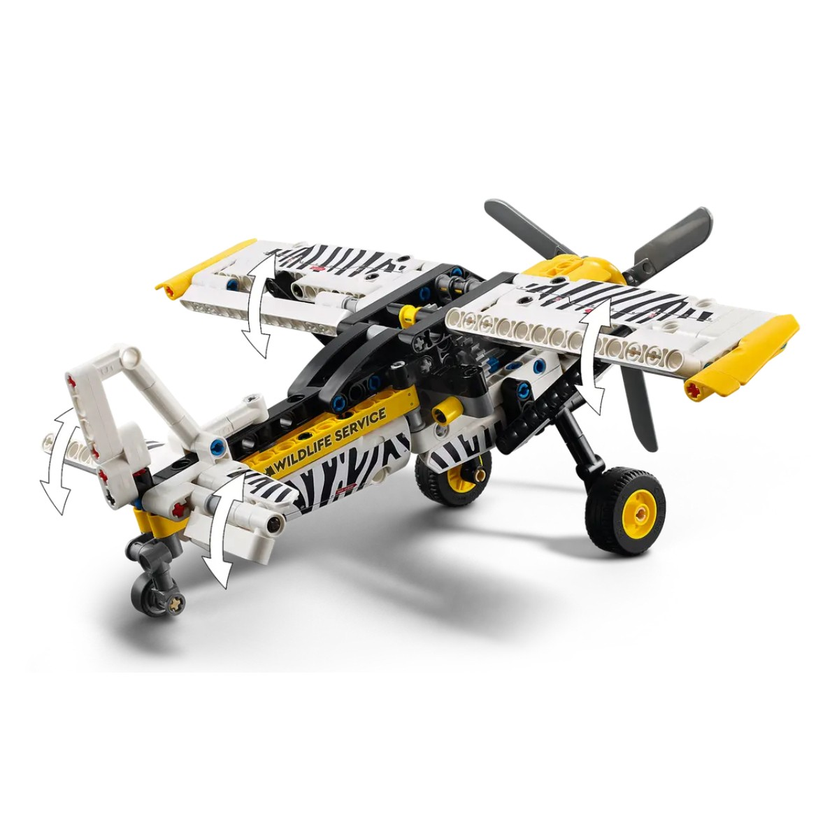 Samolot Lego w paski zebry. Ma żółte skrzydła i koła. Tło jest białe.