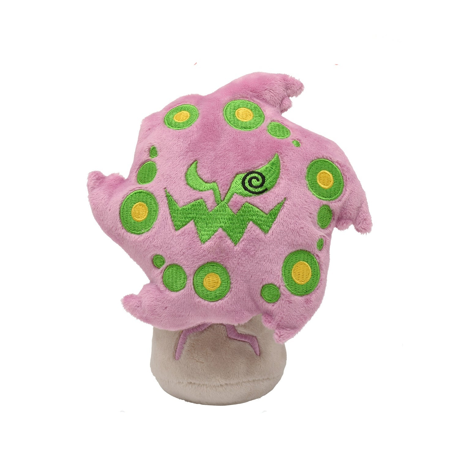 Ein Plüschtier in Form eines Pilzes, rosa mit grünen Punkten und einem grünen Gesicht.