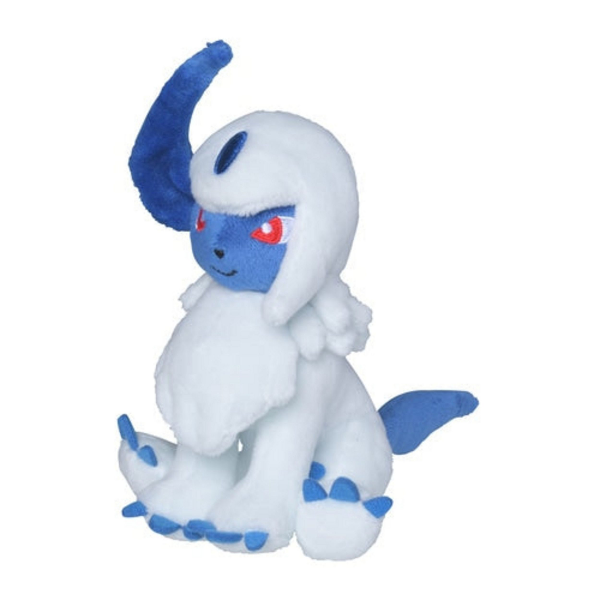 Ein weißes Plüschtier mit blauen Akzenten. Es hat ein gebogenes blaues Horn und sitzt.