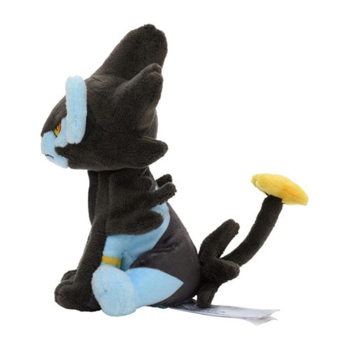 Seitenansicht eines schwarz-blauen Plüschtiers einer katzenartigen Kreatur mit gelben Ohren und Schwanzspitze.
