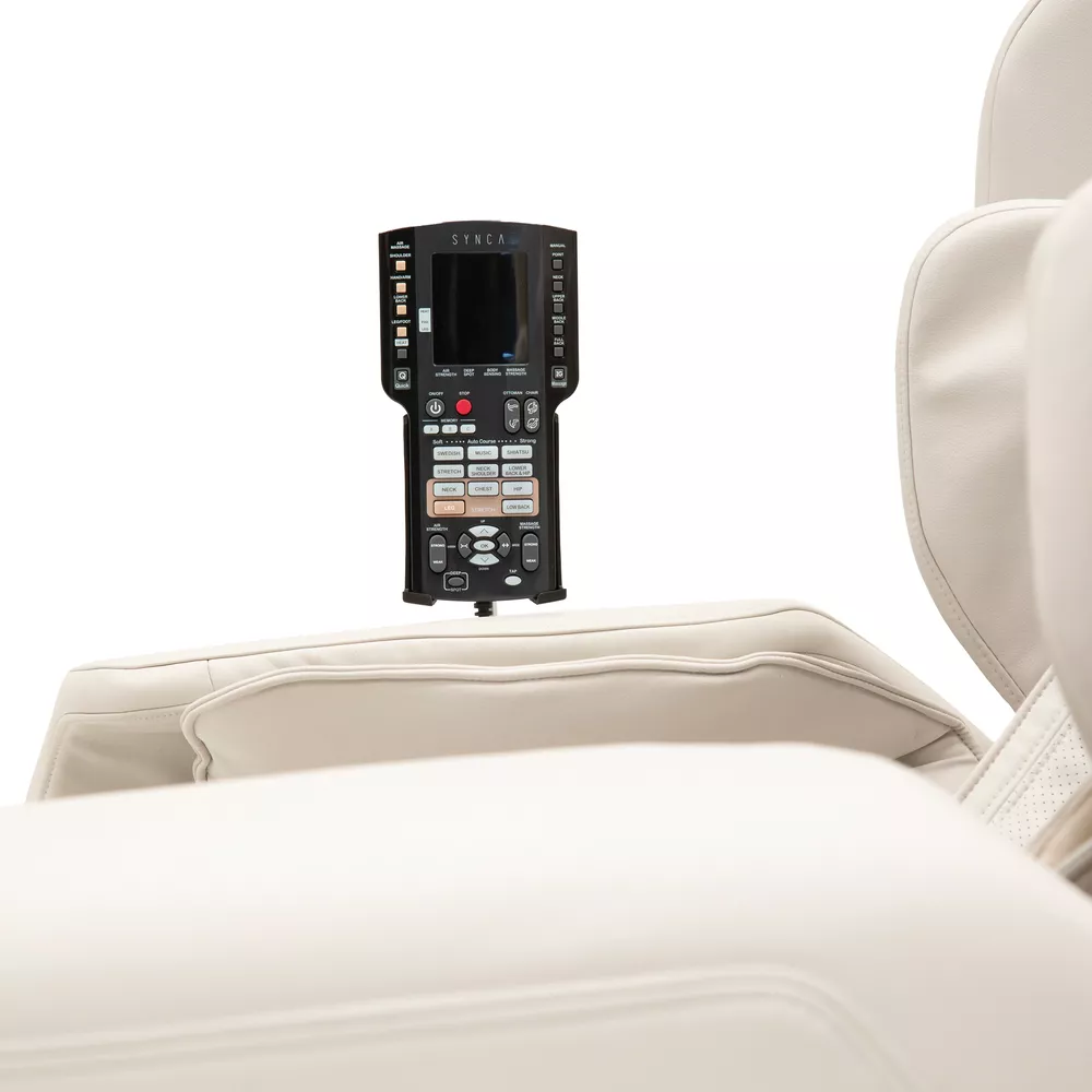 A massage chair remote control on a white chair. The background is white.