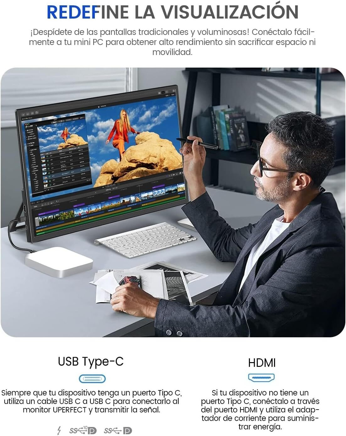 Hombre usando un lápiz óptico en un monitor, con un teclado y un dispositivo blanco en un escritorio. Texto al fondo.