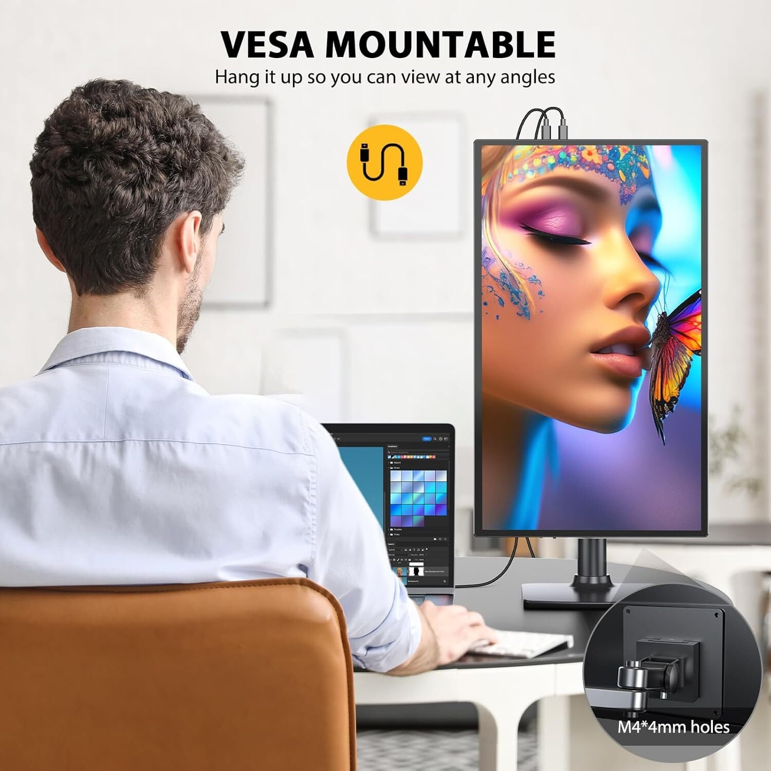 Una persona usando una laptop conectada a un monitor, el monitor muestra una imagen colorida.
