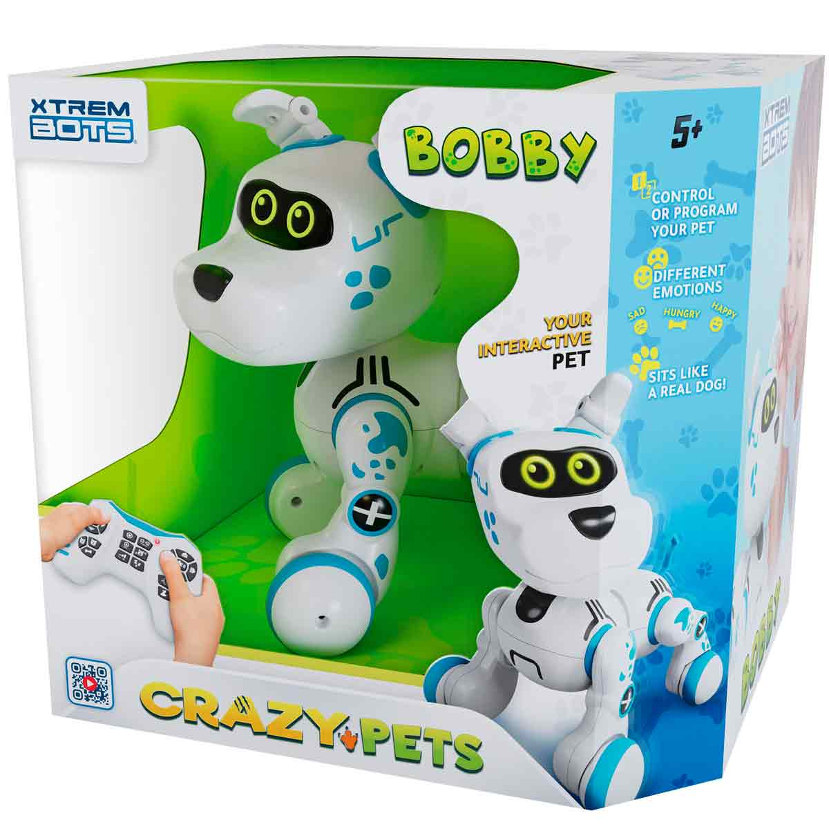 Un juguete de perro robot blanco y azul en una caja, con un control remoto. La caja dice 'Crazy Pets'.