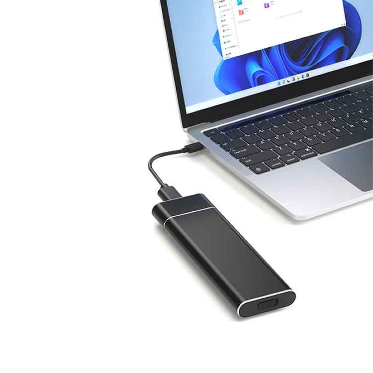 Eine schwarze externe Festplatte, die mit einem USB-Kabel an einen Laptop angeschlossen ist.