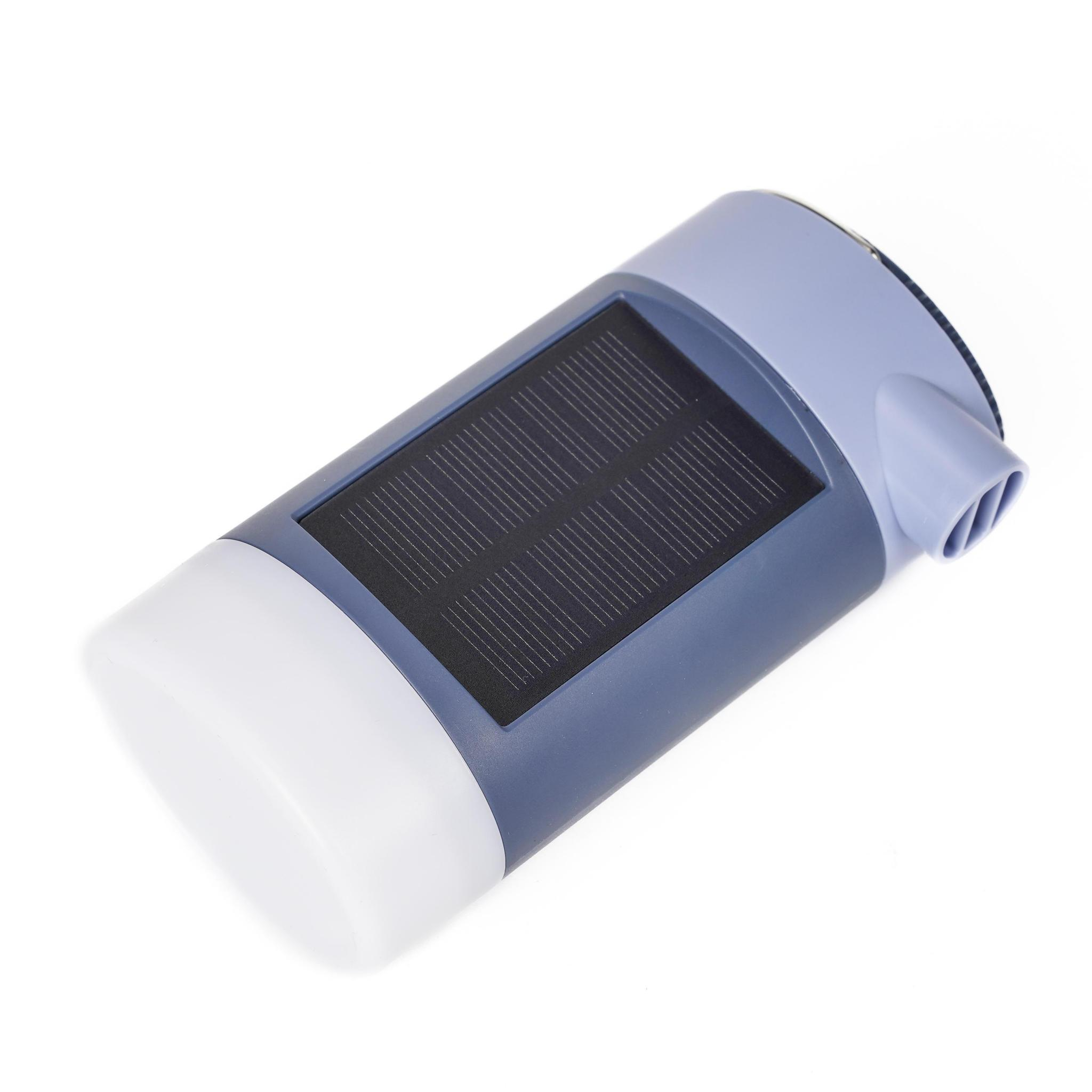 Zylindrisches Gerät mit Solarpanel, Lichtteil und blau-grauem Gehäuse.
