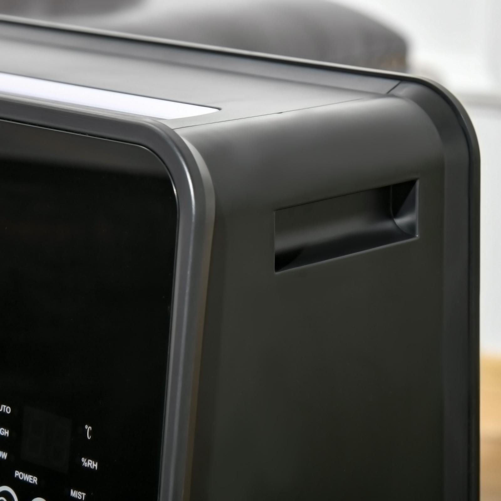 Nahaufnahme eines schwarzen Computerturms mit Griff und Bildschirm.