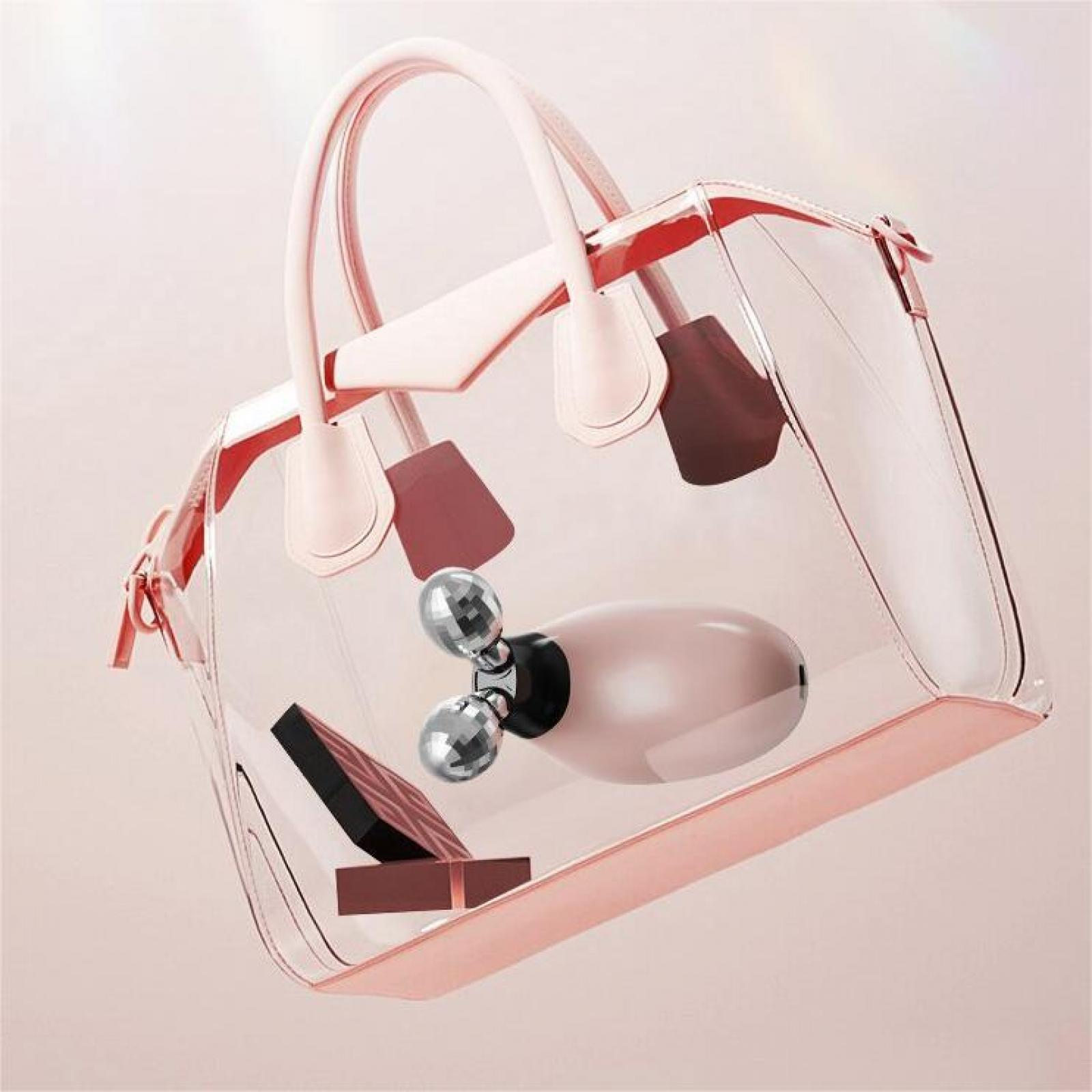Transparente rosa Handtasche mit Gesichtsmassagegerät und Zubehör darin.