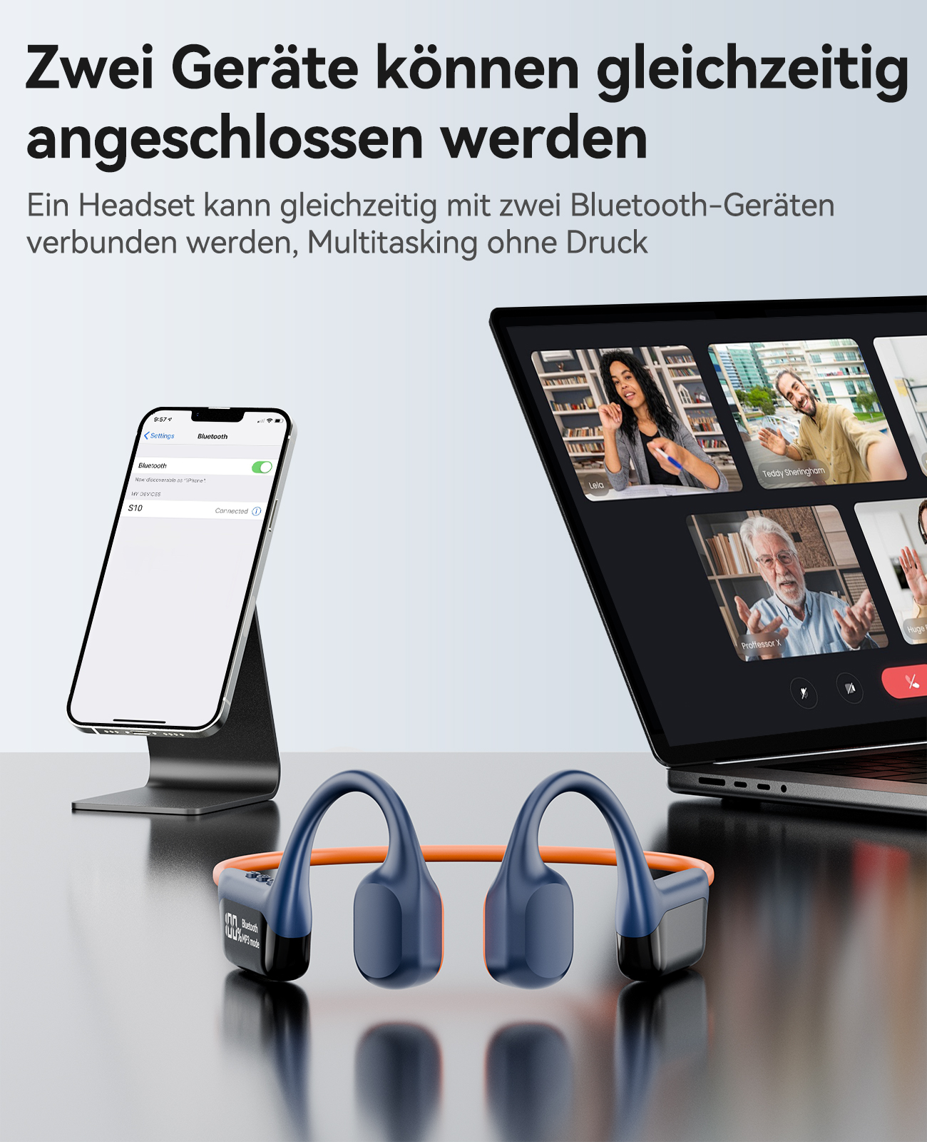 Das Bild zeigt ein Telefon, einen Laptop mit Videoanrufen und Knochenleitungskopfhörer auf einem Tisch.