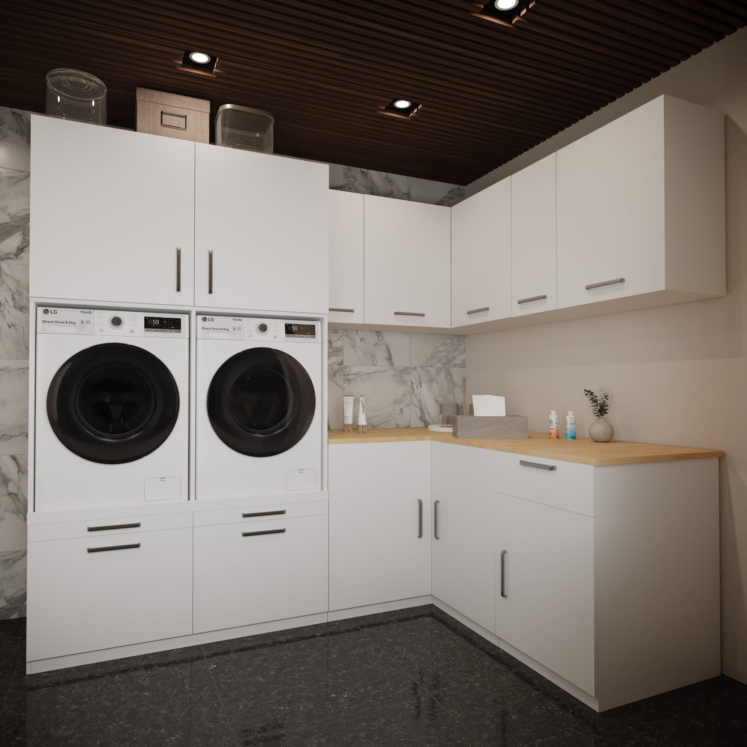 Moderne Waschküche mit zwei Waschmaschinen, Schränken und einer Holz-Arbeitsplatte.