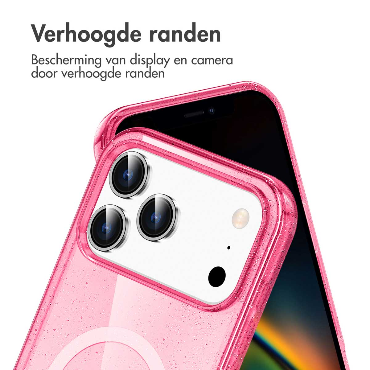 Un téléphone rose avec une coque rose à paillettes. L'étui a des bords surélevés.