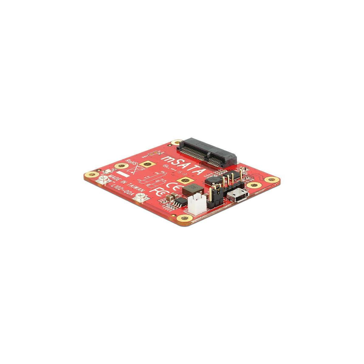 Scheda di circuito rossa con più componenti. È un piccolo quadrato e ha connettori.