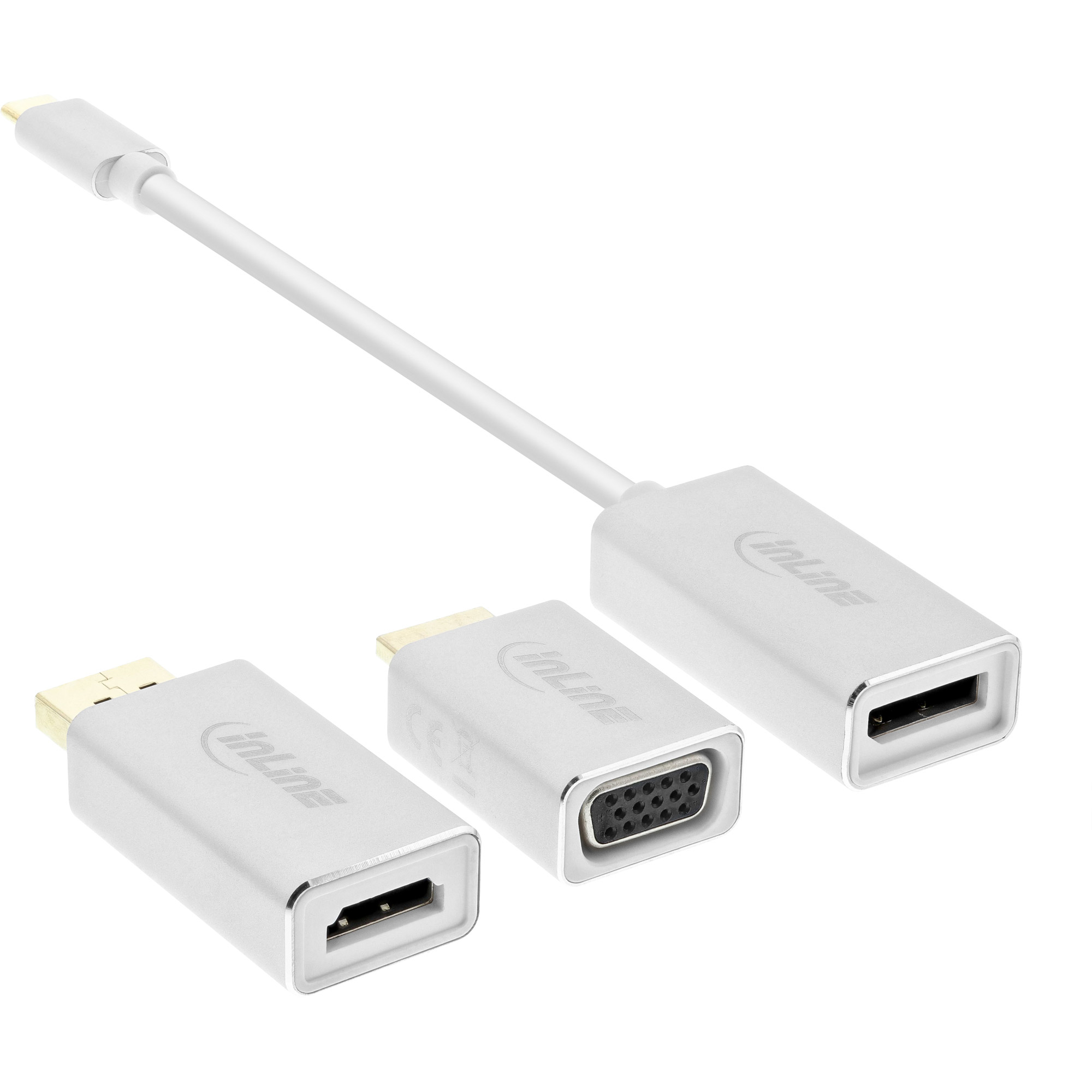 Tre adattatori Inline argentati: USB-C, VGA e HDMI. L'adattatore USB-C è collegato agli altri due.
