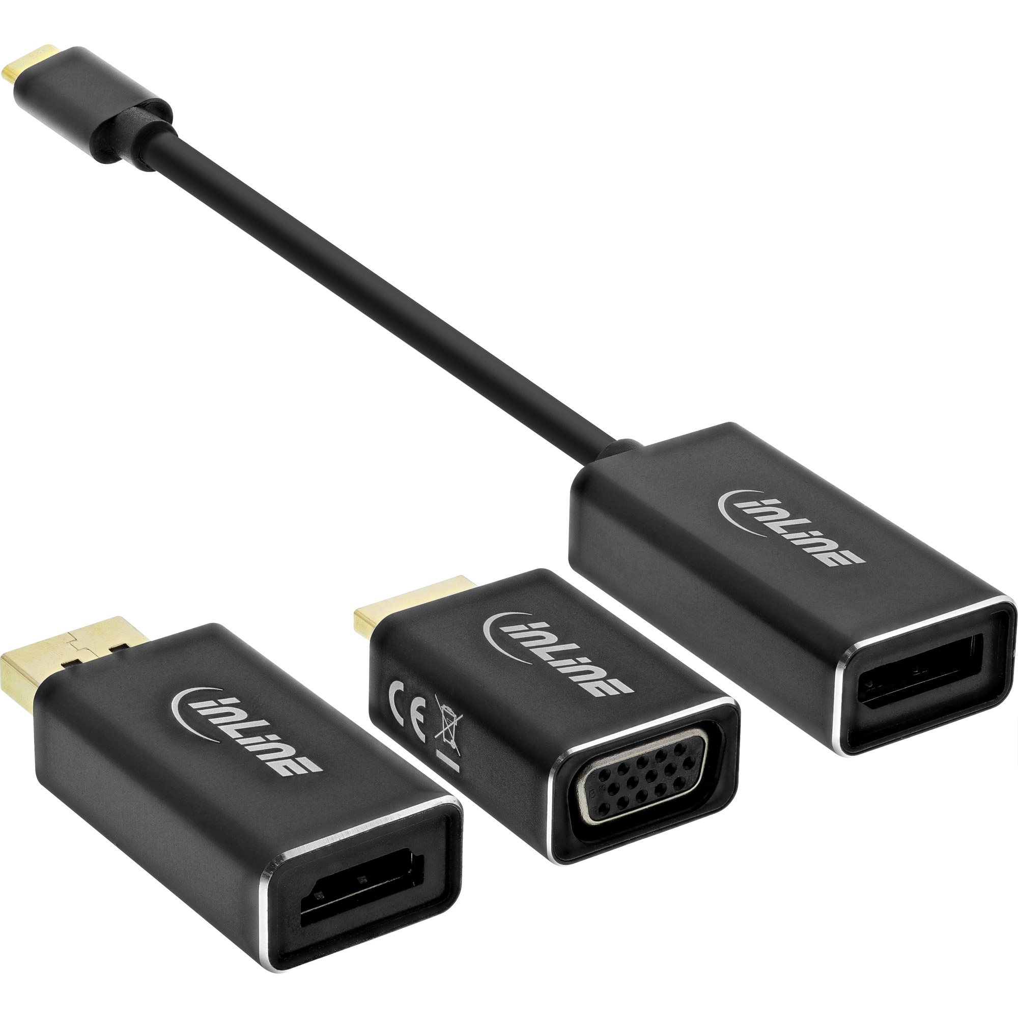 Tre adattatori Inline neri: USB-C, VGA e HDMI. L'adattatore USB-C è collegato agli altri due.