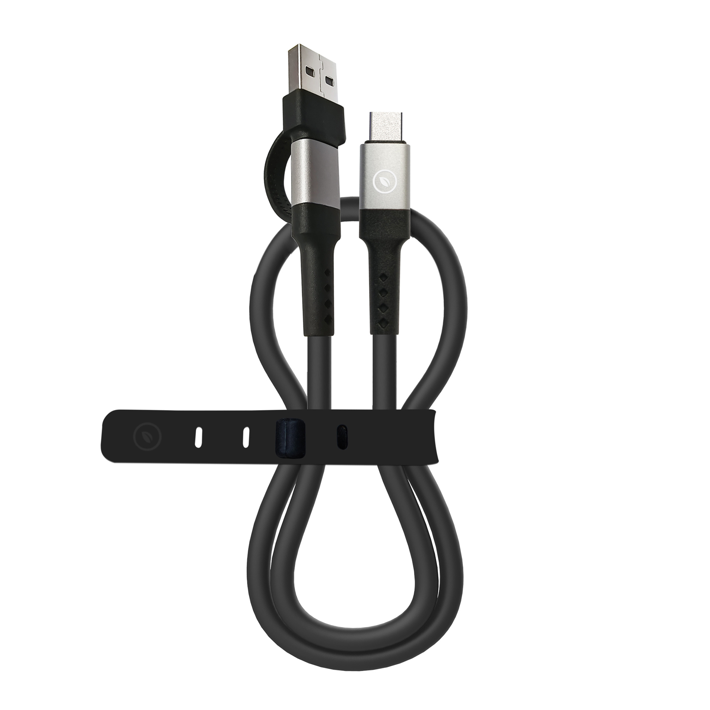 Un cable negro doblado y asegurado con una correa negra. El cable tiene dos conectores diferentes.