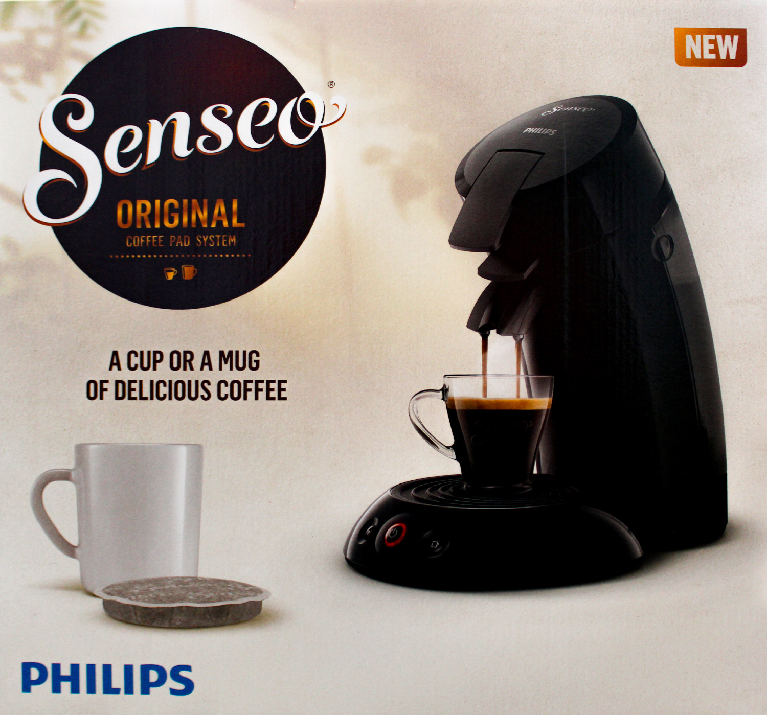 Ekspres do kawy z filiżanką nalewającą kawę, kapsułą i białym kubkiem. Marka Philips.