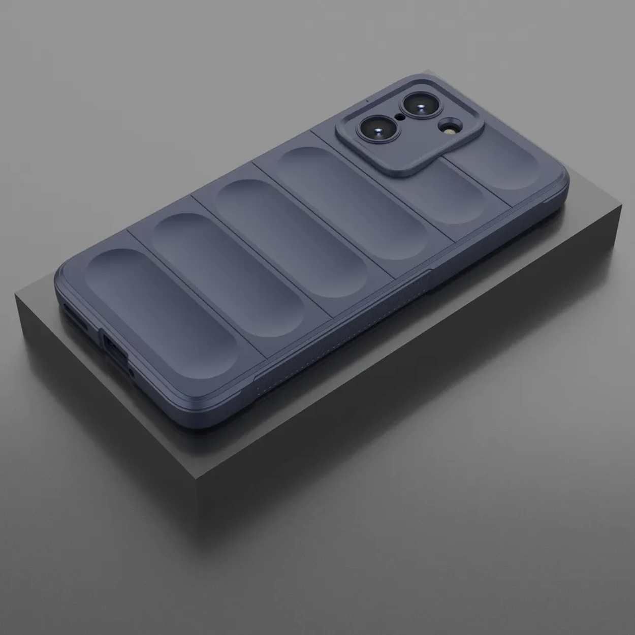 Een blauw telefoonhoesje op een zwart oppervlak. De hoes heeft lijnen en staat op een standaard.