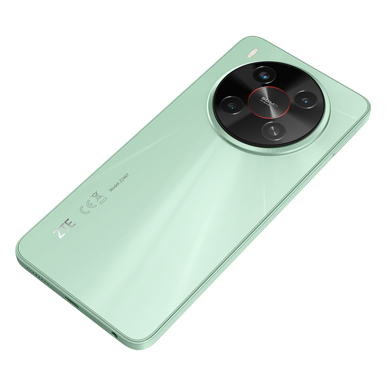 Miętowo-zielony smartfon ZTE leży na białej powierzchni. Posiada duży, okrągły moduł kamery z wieloma obiektywami.