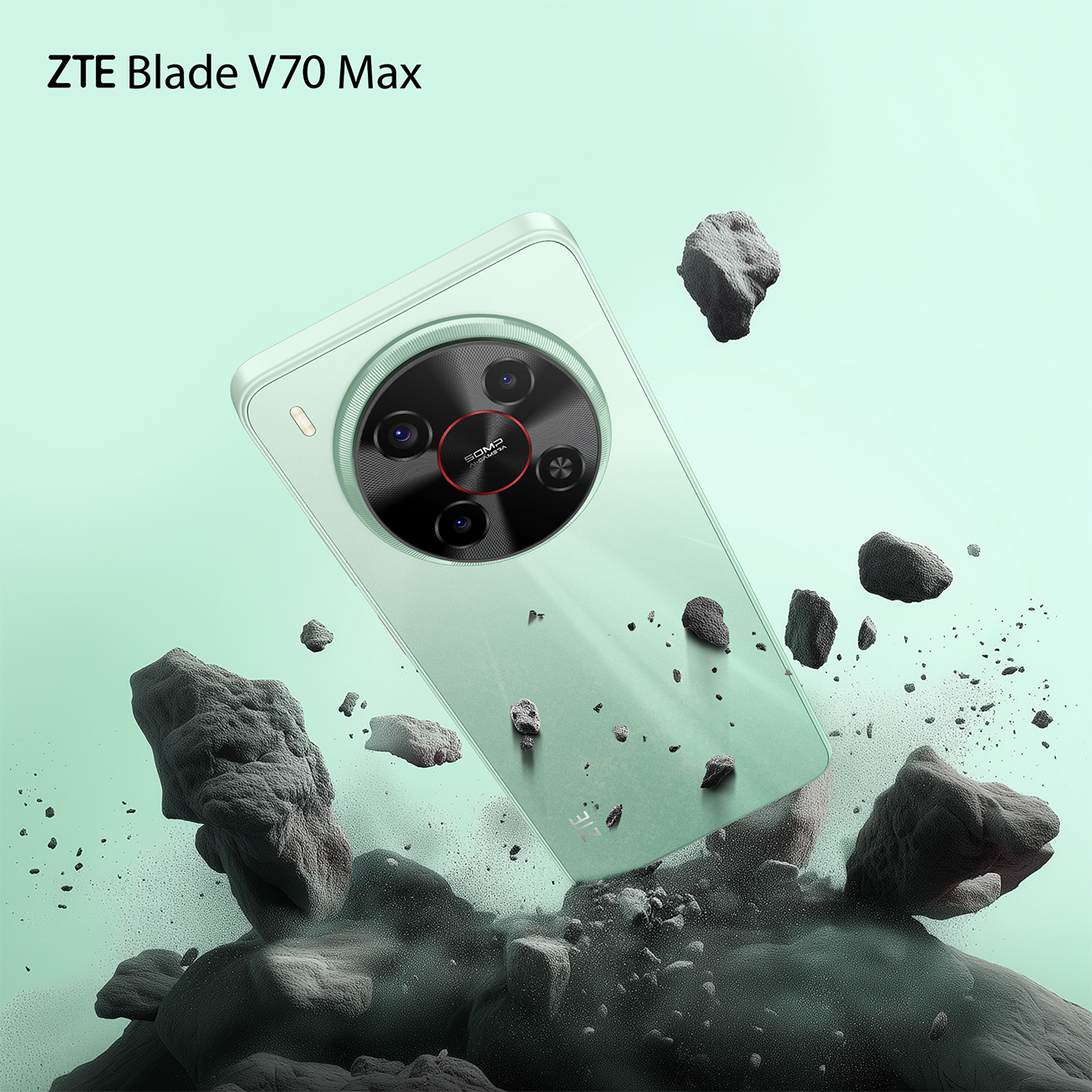 Telefon ZTE Blade V70 Max. Telefon jest jasnozielony. Szare skały otaczają telefon. Aparat jest widoczny.