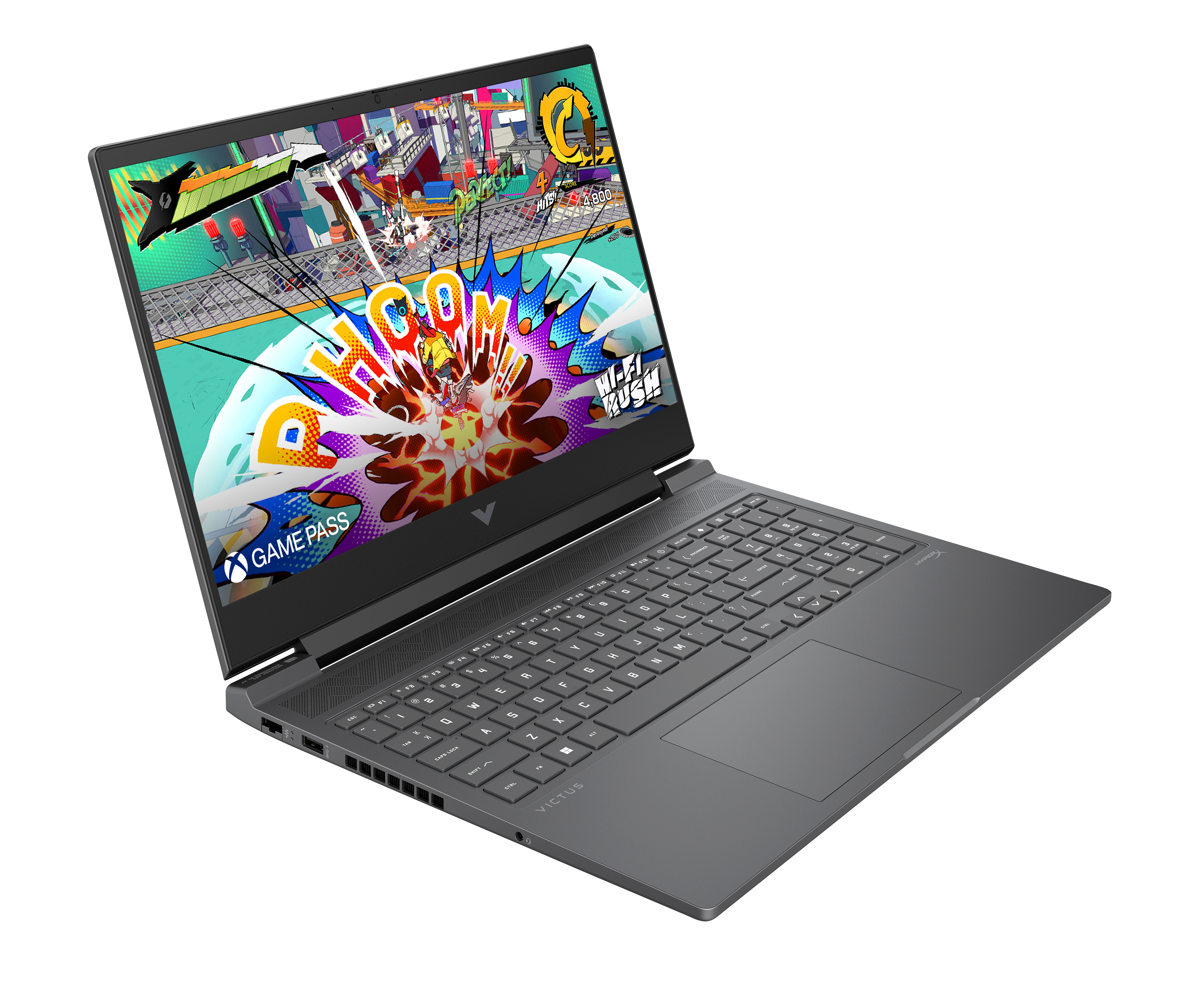 Laptop wyświetlający kolorową scenę z gry wideo. Widoczna klawiatura, ekran pokazuje grafikę z gry.