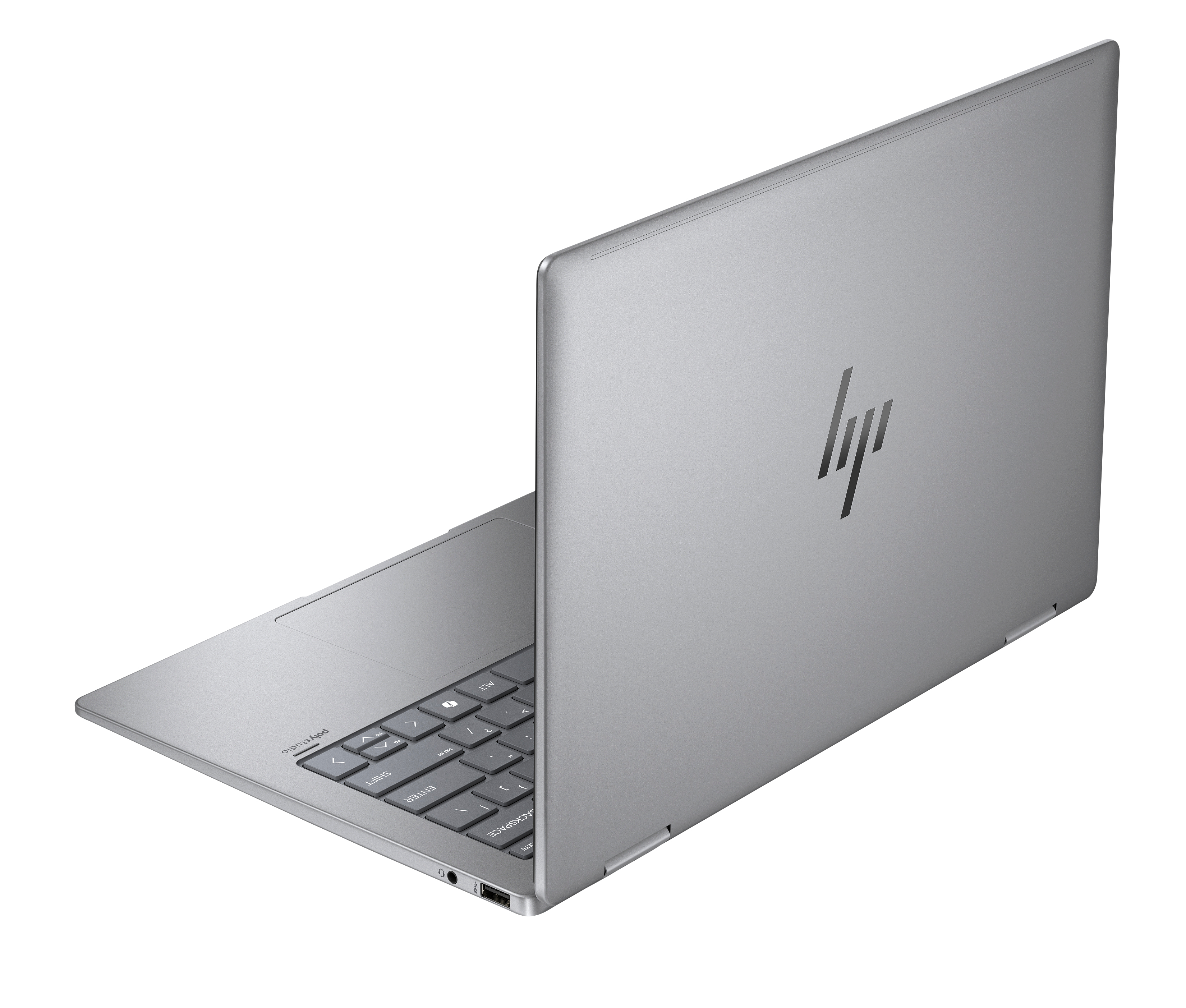 Srebrny laptop HP jest otwarty. Klawiatura jest widoczna. Logo HP znajduje się z tyłu.