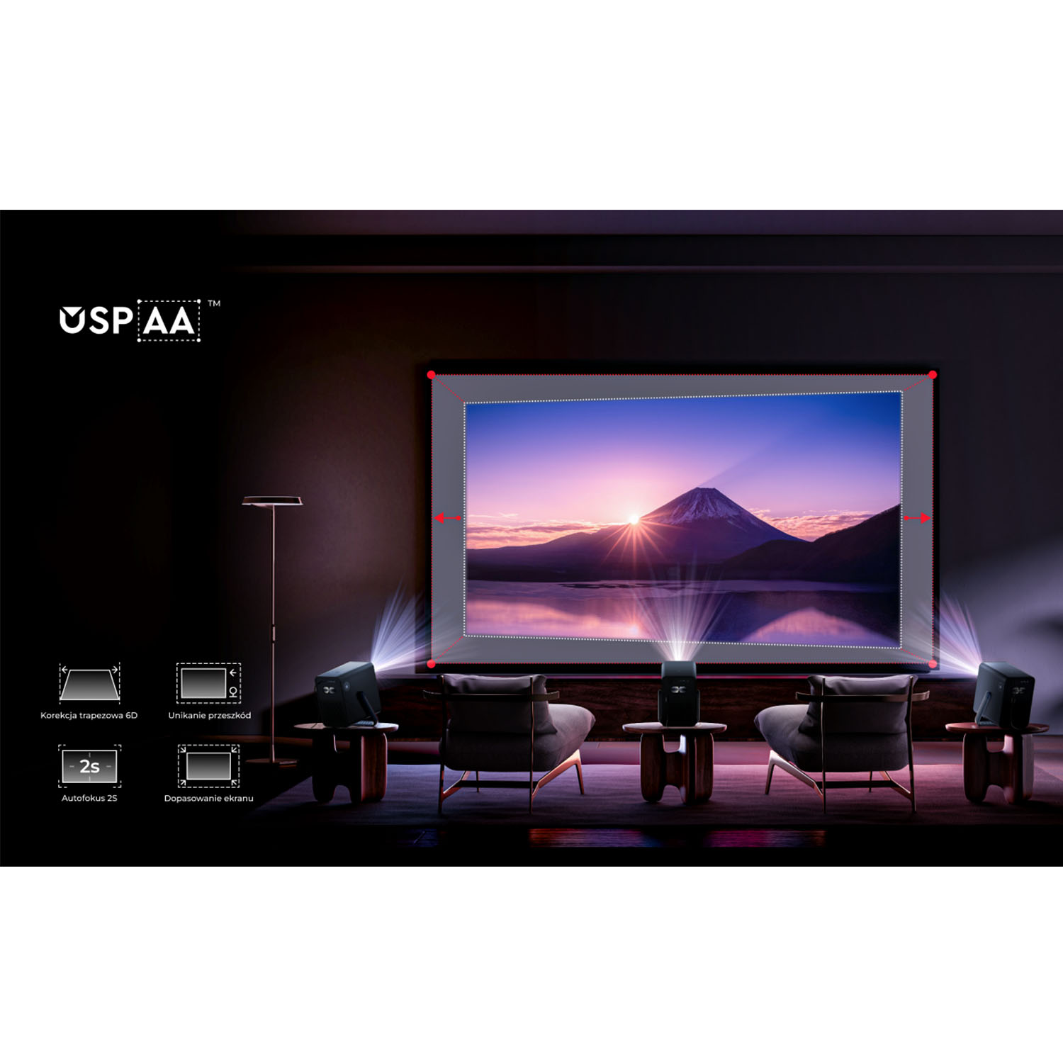 Projektor wyświetla scenę górską. Jest otoczony krzesłami, małymi stolikami i innymi projektorami. Widoczna jest nazwa marki.