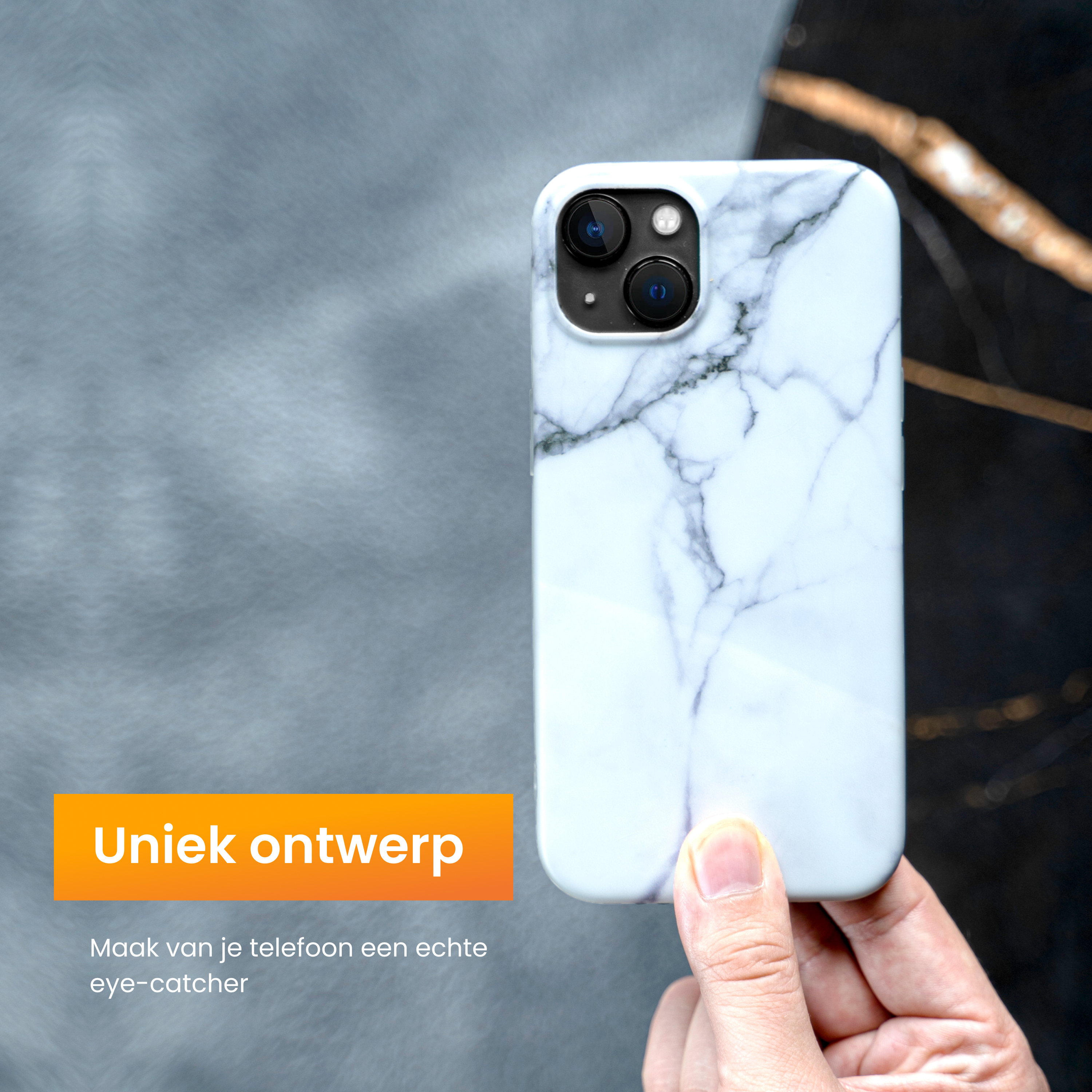 A hand holds a marble-patterned phone case. The background has a dark gray and black textured surface.