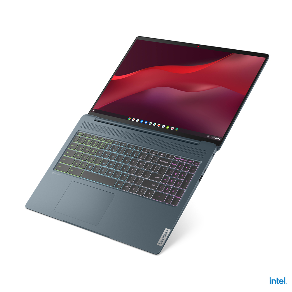 Ein blauer Lenovo-Laptop mit offenem Bildschirm, der einen roten Farbverlauf anzeigt. Die Tastatur ist farbenfroh beleuchtet.