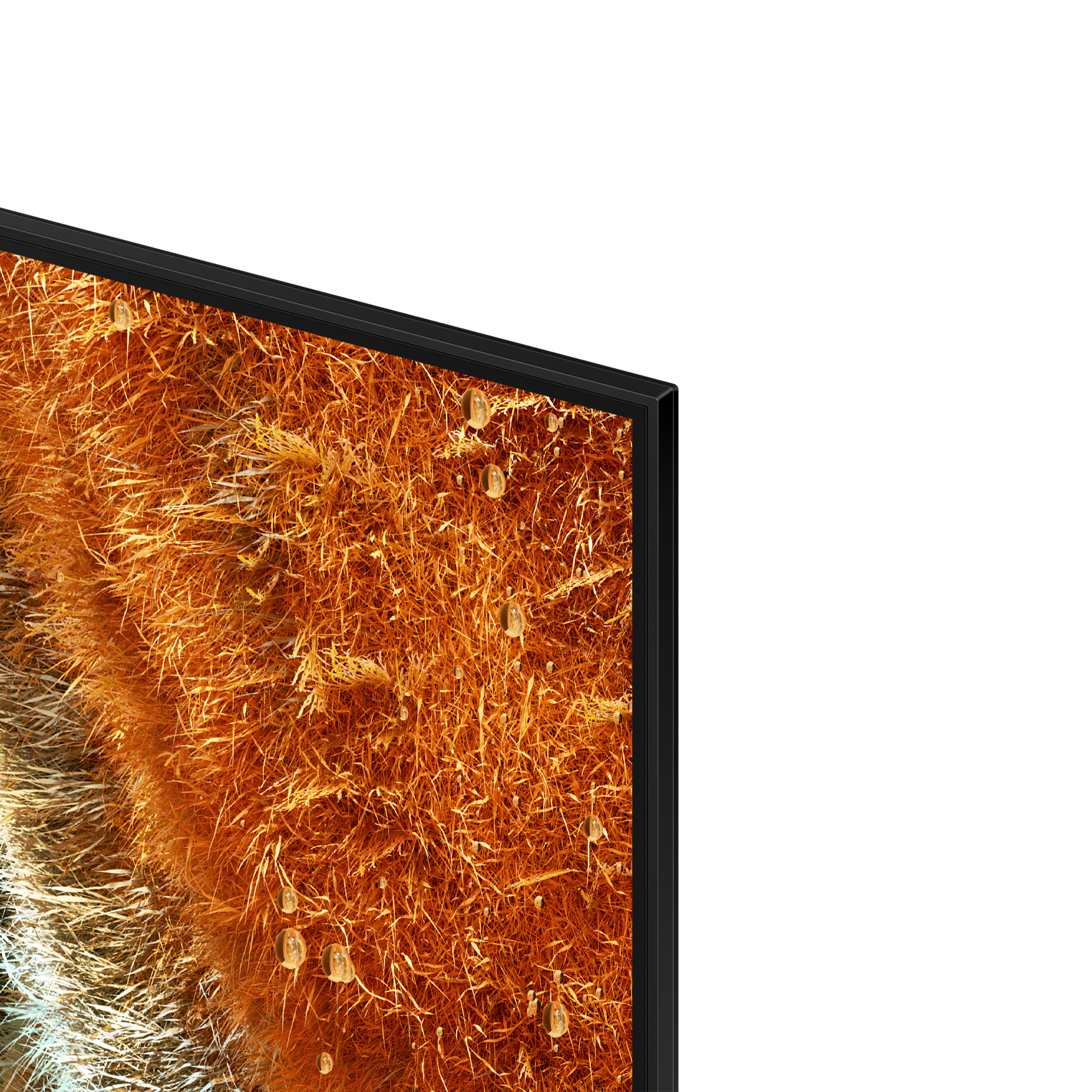 Gros plan d'un écran de télévision. L'écran affiche un fond texturé orange-brun avec des gouttelettes d'eau, encadré par une lunette noire.