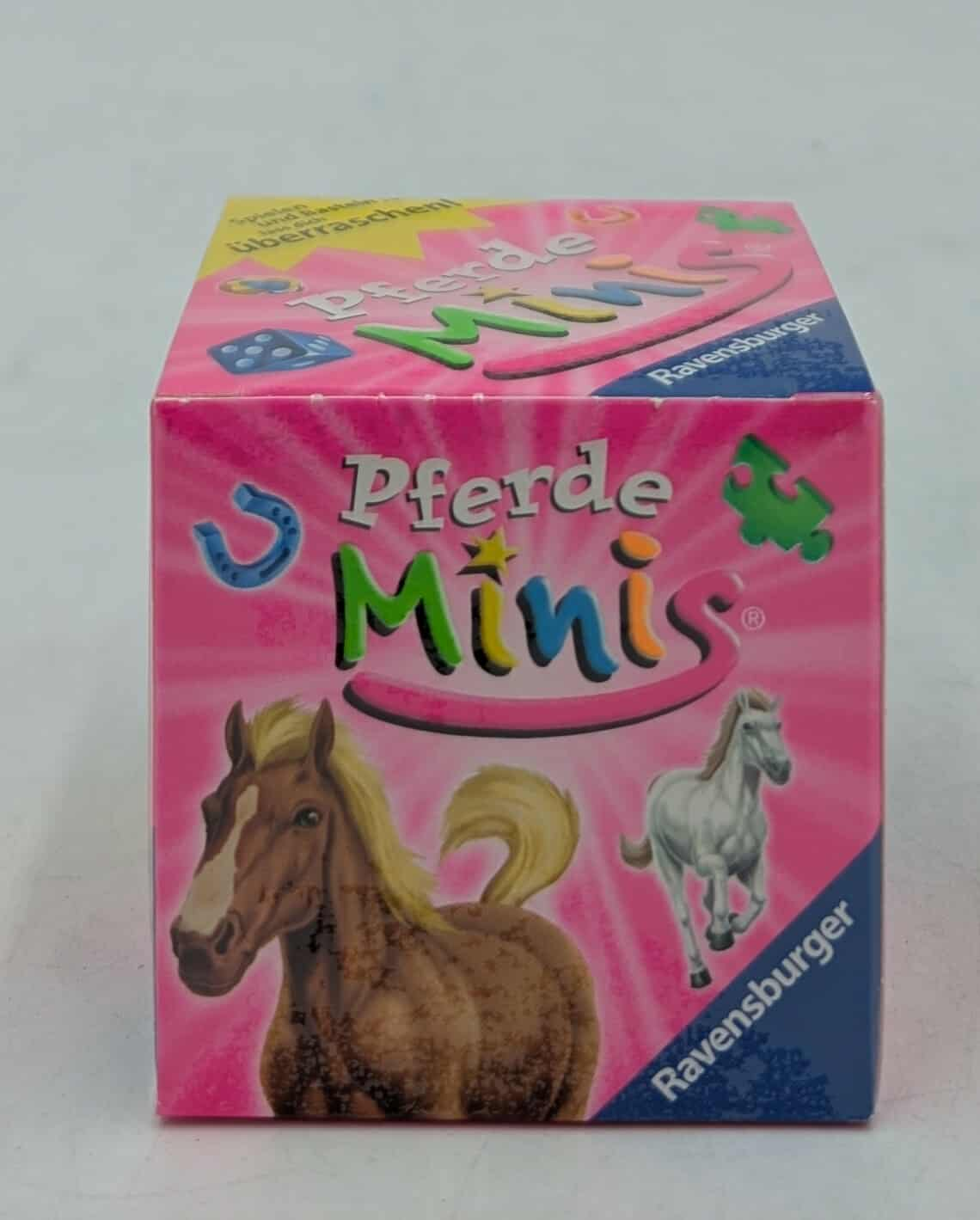Rosa Box mit 'Pferde Minis' und Pferdeillustrationen. Ravensburger-Logo sichtbar.