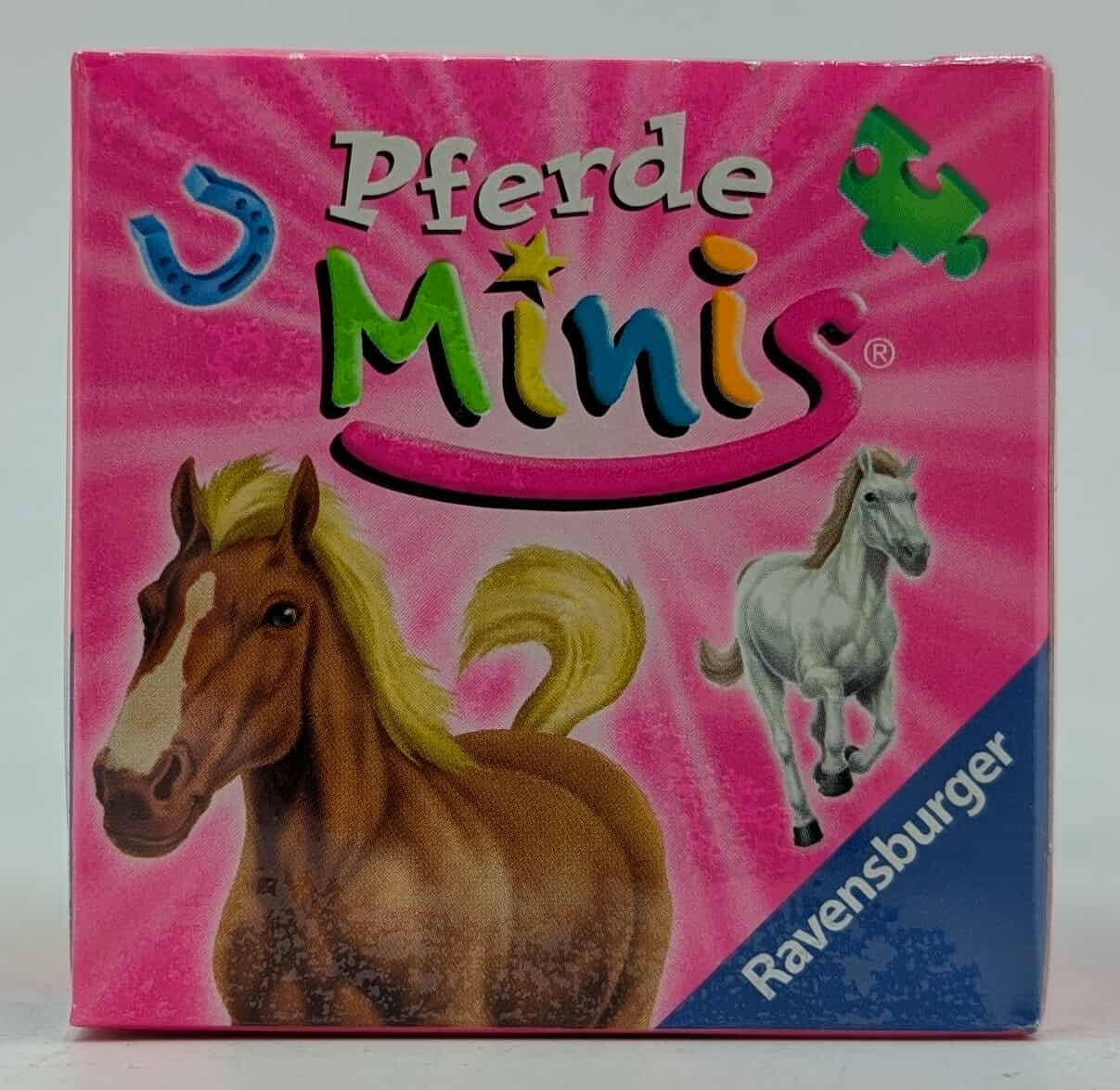 Rosa Schachtel mit Text 'Pferde Minis'. Enthält Pferdeillustrationen und ein Puzzleteil. Ravensburger-Logo unten rechts.
