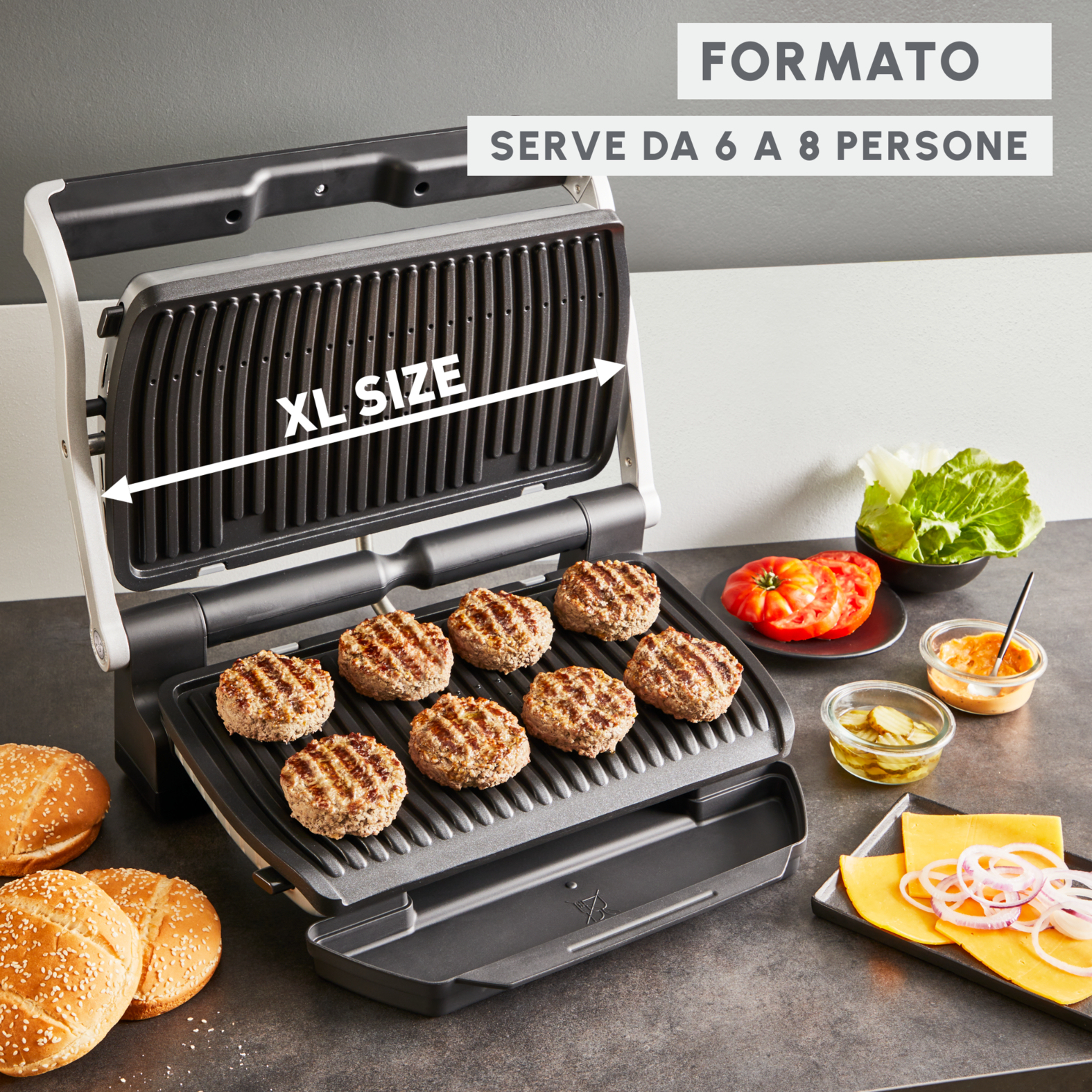 Ein XL-Grill mit gegrillten Burgern. Beilagen wie Brötchen, Tomaten, Salat und Käse sind in der Nähe platziert.
