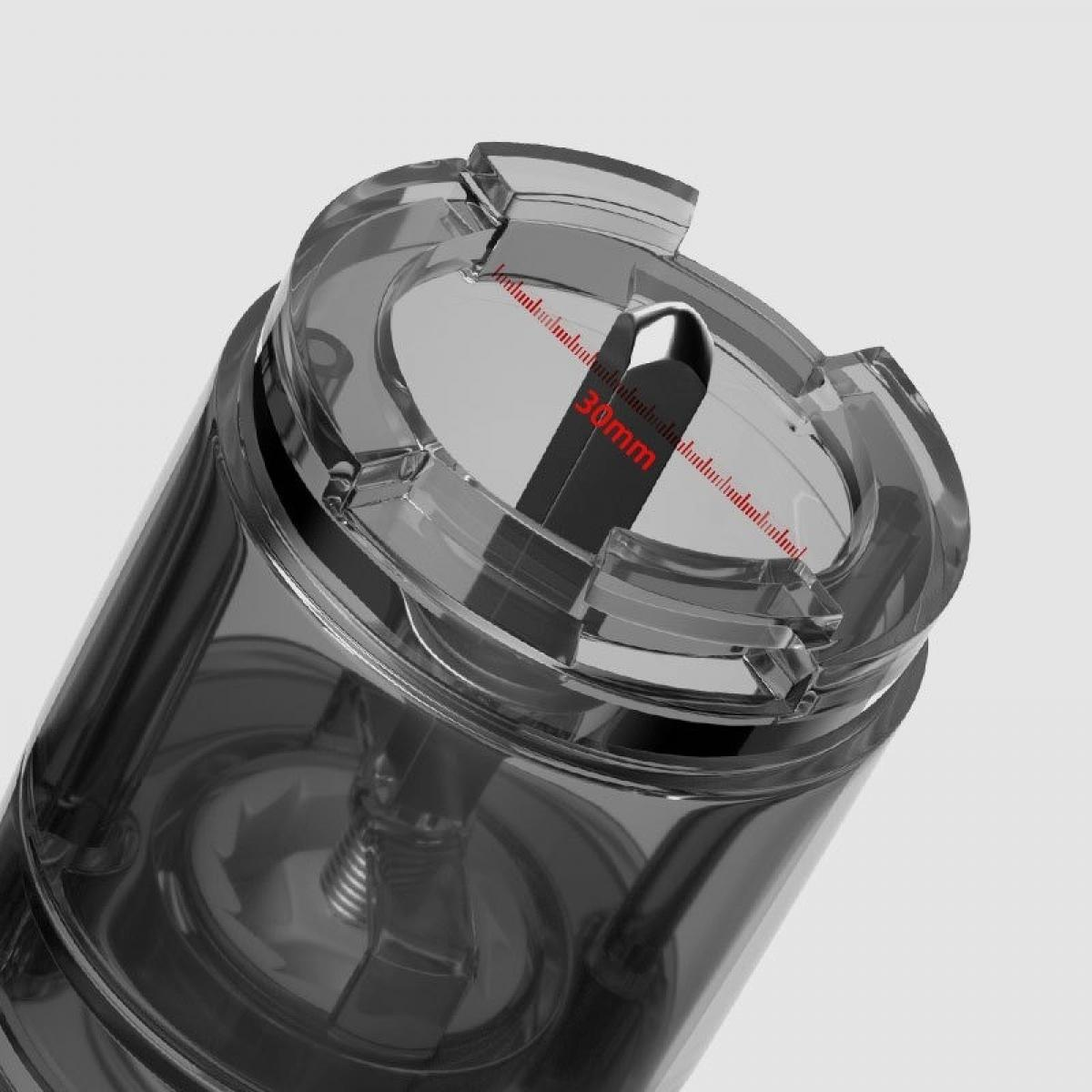 Ein transparentes zylindrisches Gerät mit einer 30-mm-Messung auf einem schwarzen Stück. Der Hintergrund ist hellgrau.