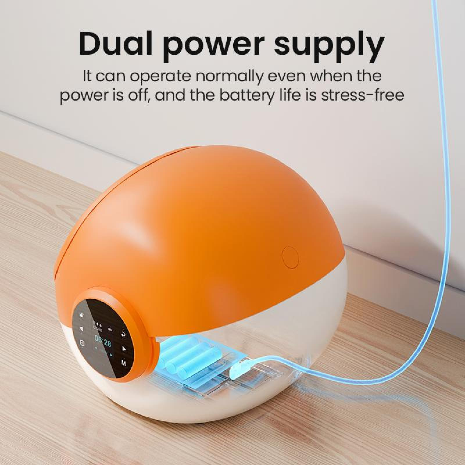 Oranges und weißes Gerät mit Bildschirm. Es hat ein blaues Kabel. Text: "Dual power supply."