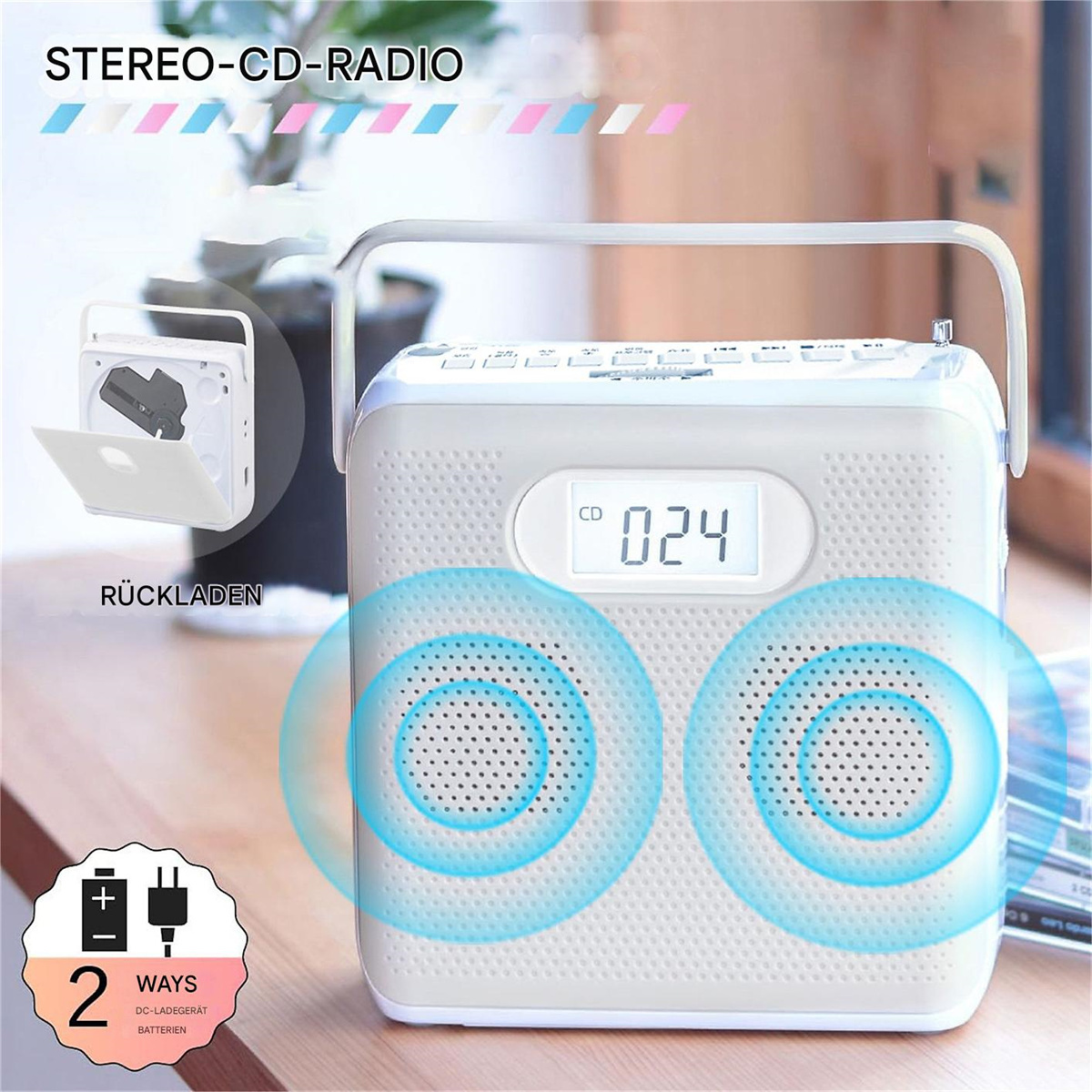 Ein weißes Stereo-CD-Radio mit Griff. Es hat eine Digitalanzeige, zwei Lautsprecher und ein Batterie-/Lade-Symbol. Die Rückseite zeigt den CD-Ladebereich.
