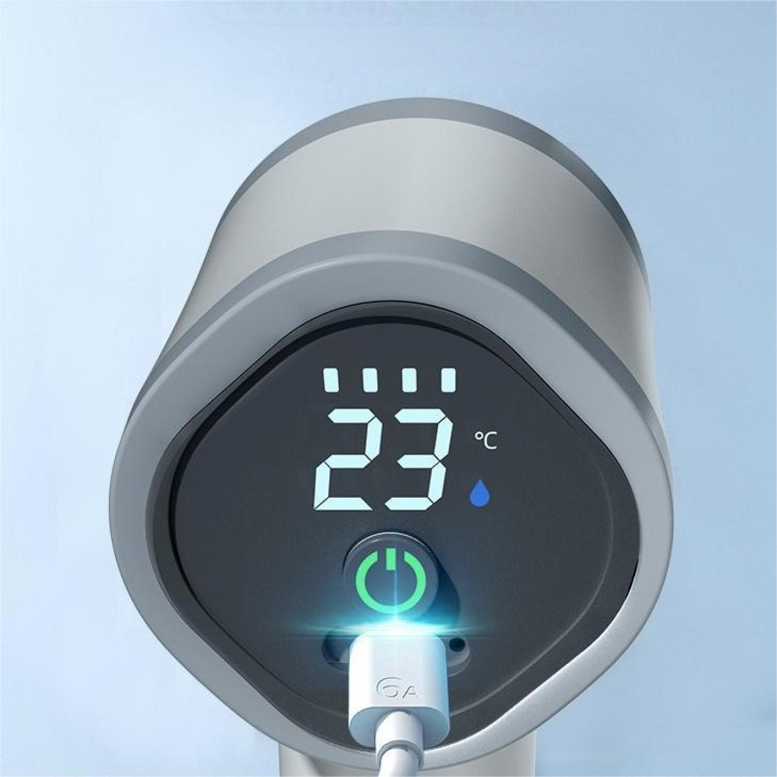 Ein digitales Gerät zeigt 23°C an. Eine Ein-/Aus-Taste leuchtet grün. Ein Ladekabel ist angeschlossen.