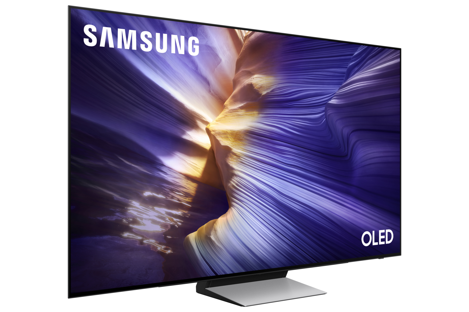 TV OLED Samsung. Lo schermo mostra un motivo astratto ondulato in sfumature di viola, giallo e bianco. La base è argentata.