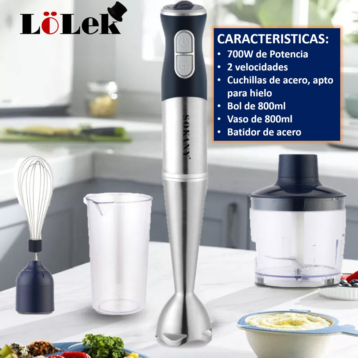 Una batidora de inmersión con accesorios en una encimera de cocina. Incluye un batidor, una taza medidora y un accesorio de procesador de alimentos.