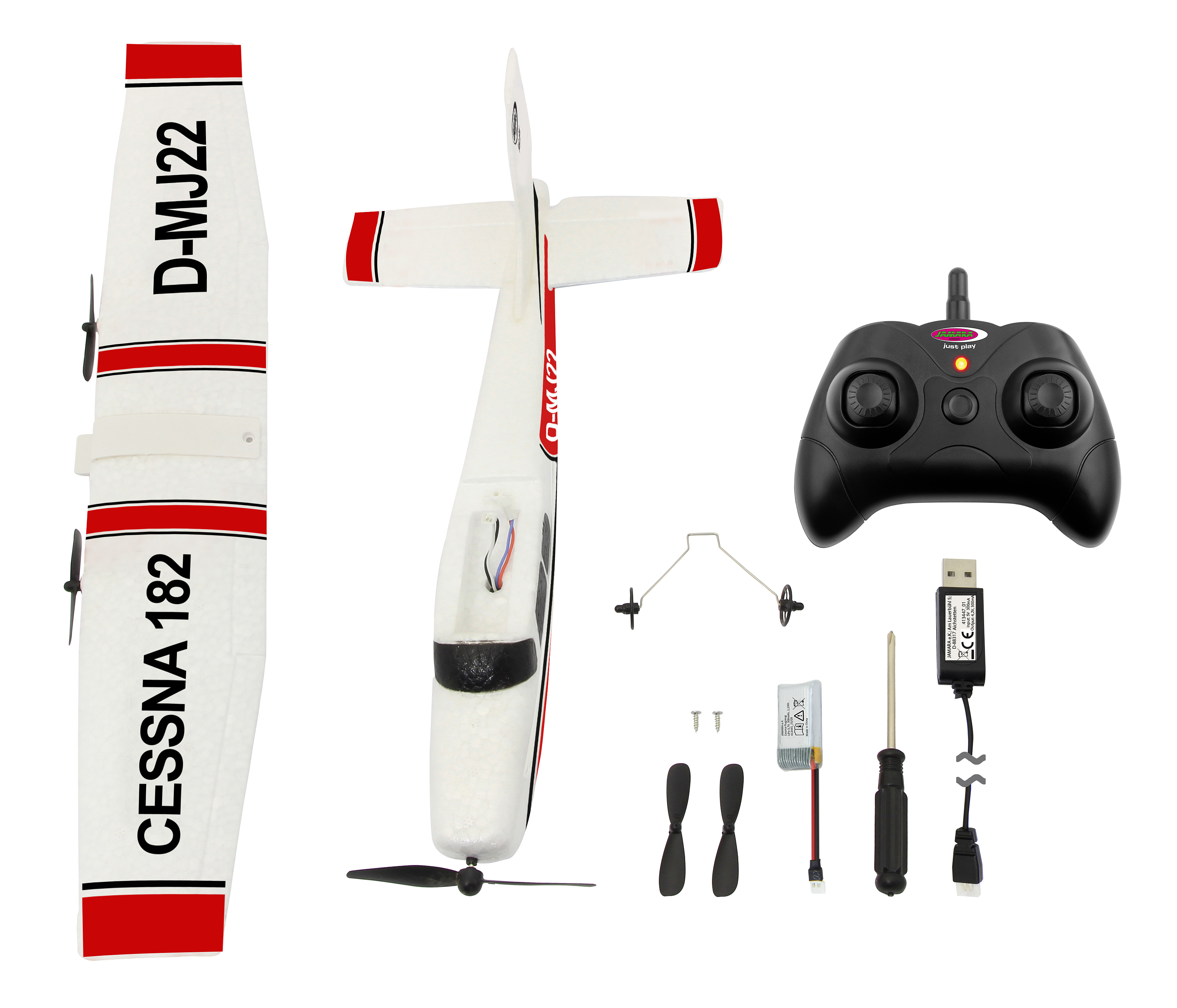 Ein weißes und rotes Modellflugzeug mit Zubehör wie Fernbedienung, Propellern und Schraubendreher auf weißem Hintergrund.