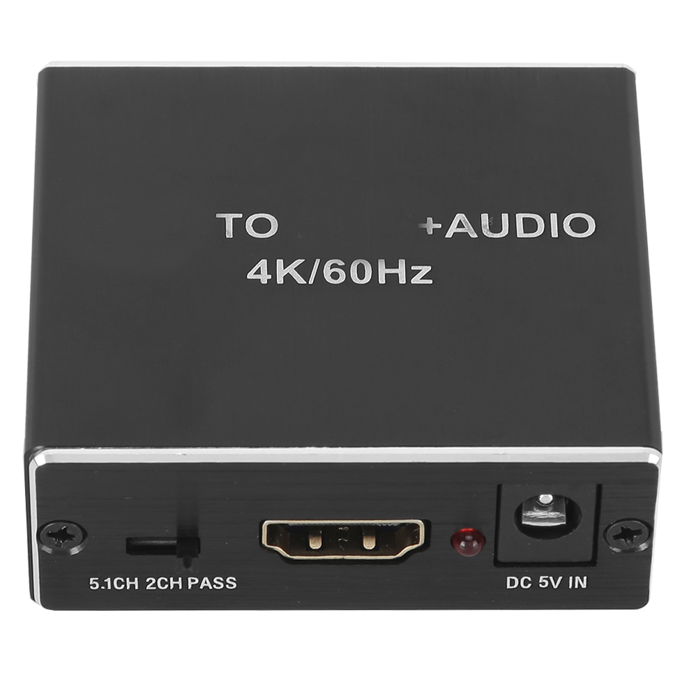 Ein schwarzes elektronisches Gerät mit dem Text 'TO +AUDIO 4K/60Hz'. Es hat einen HDMI-Anschluss, DC 5V IN und ein rotes Licht.