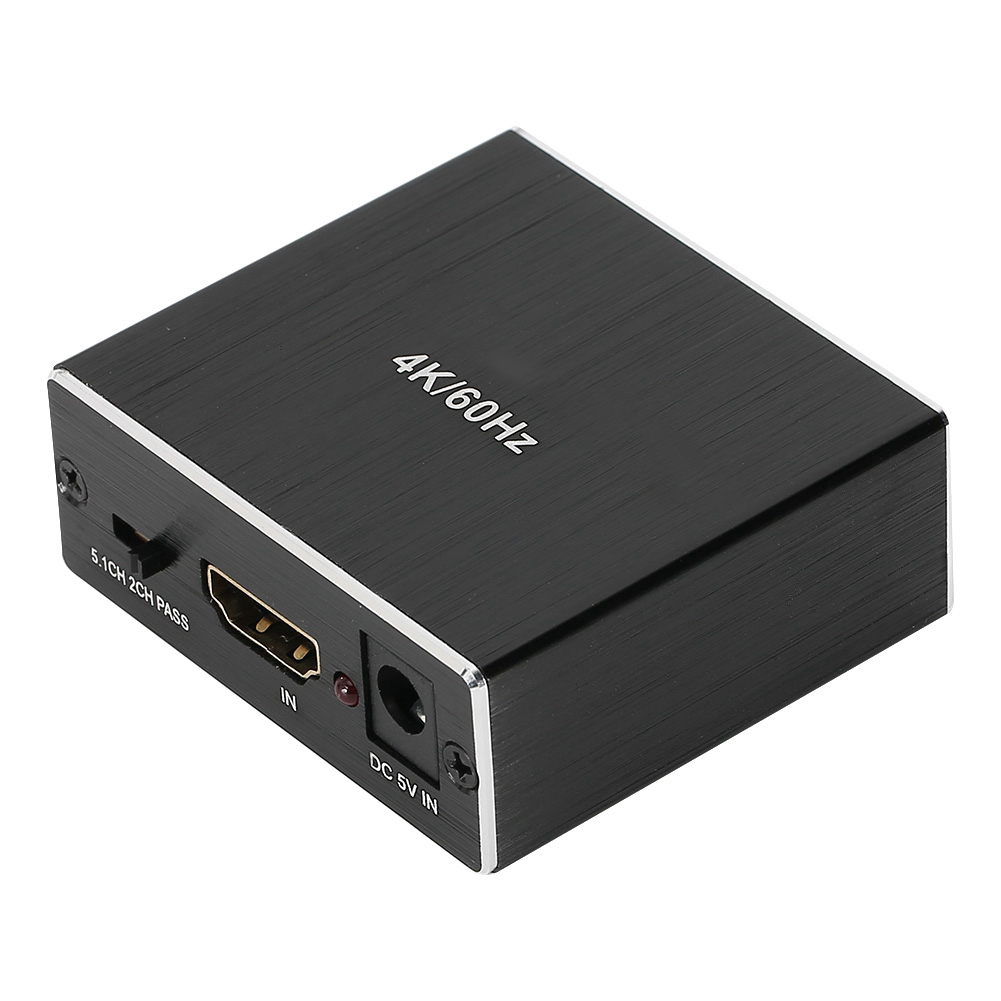 Ein schwarzes, rechteckiges Gerät mit silberner Umrandung. Es hat einen HDMI-Anschluss, Stromeingang und Aufschriften wie '4K/60Hz' und 'DC 5V IN'.