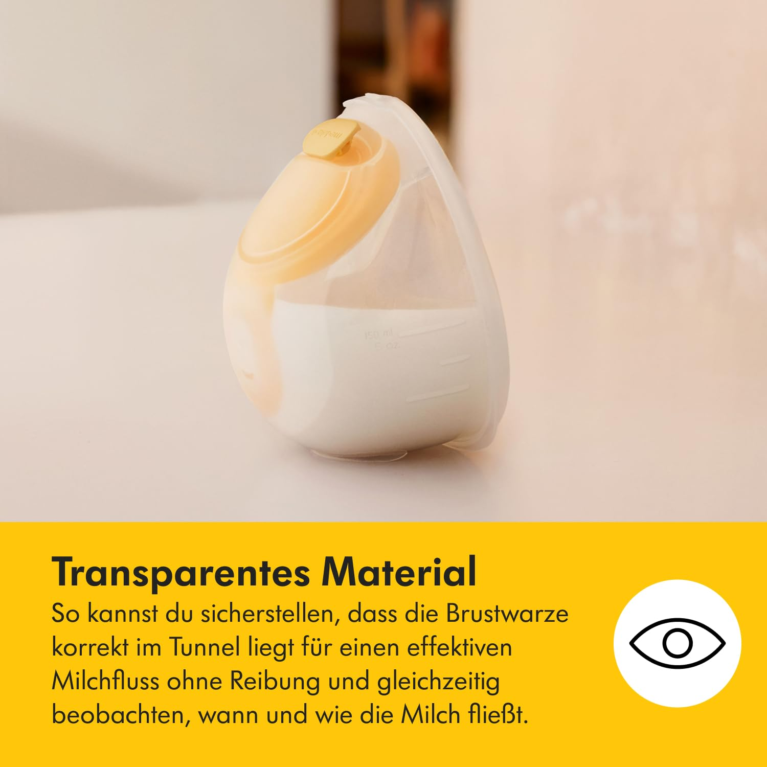 Eine transparente Brustpumpe mit gelben und weißen Komponenten, mit einem gelben Deckel und einem Behälter mit Milch.